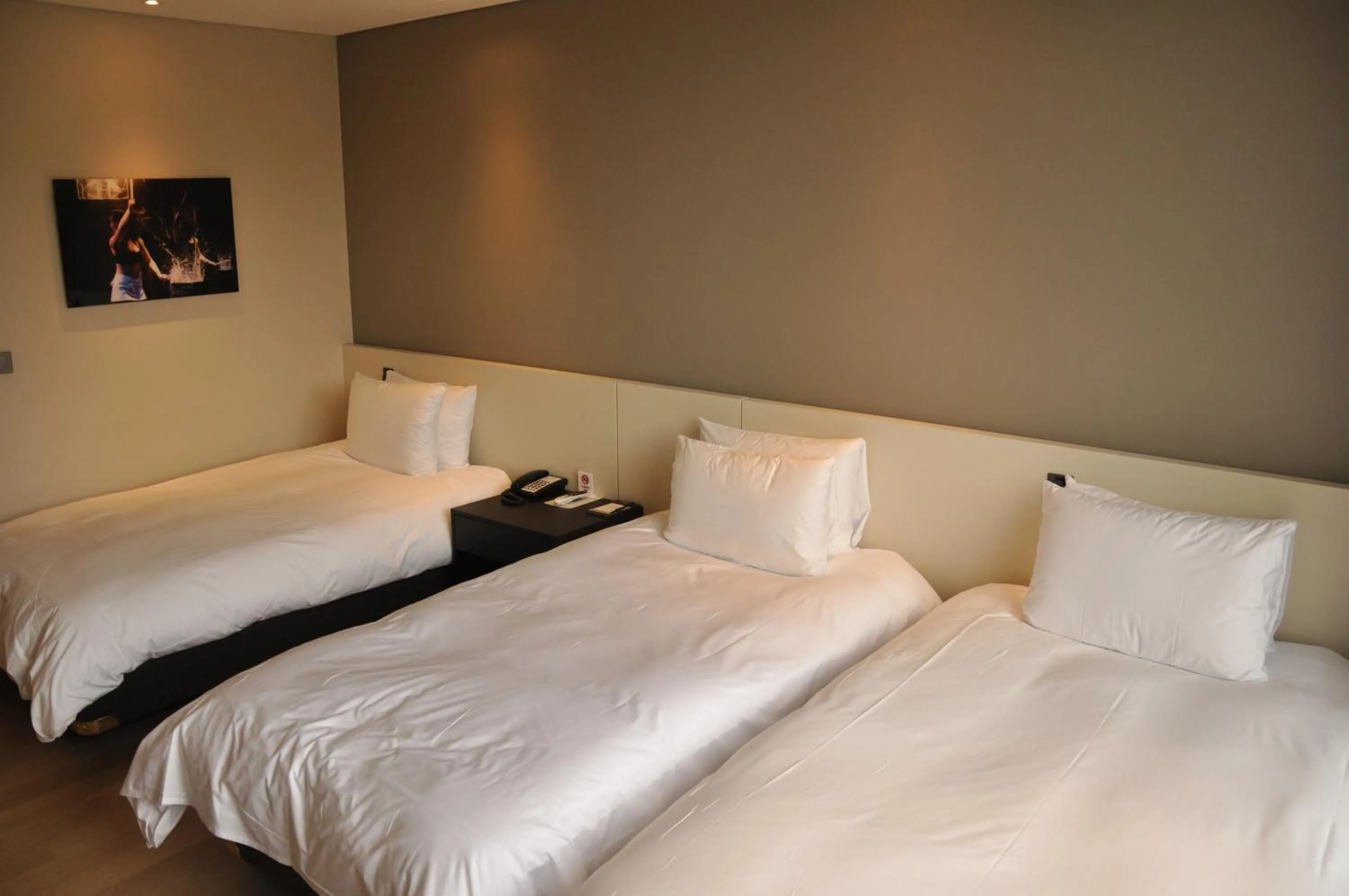 Bed in Hotel Nanta Jeju