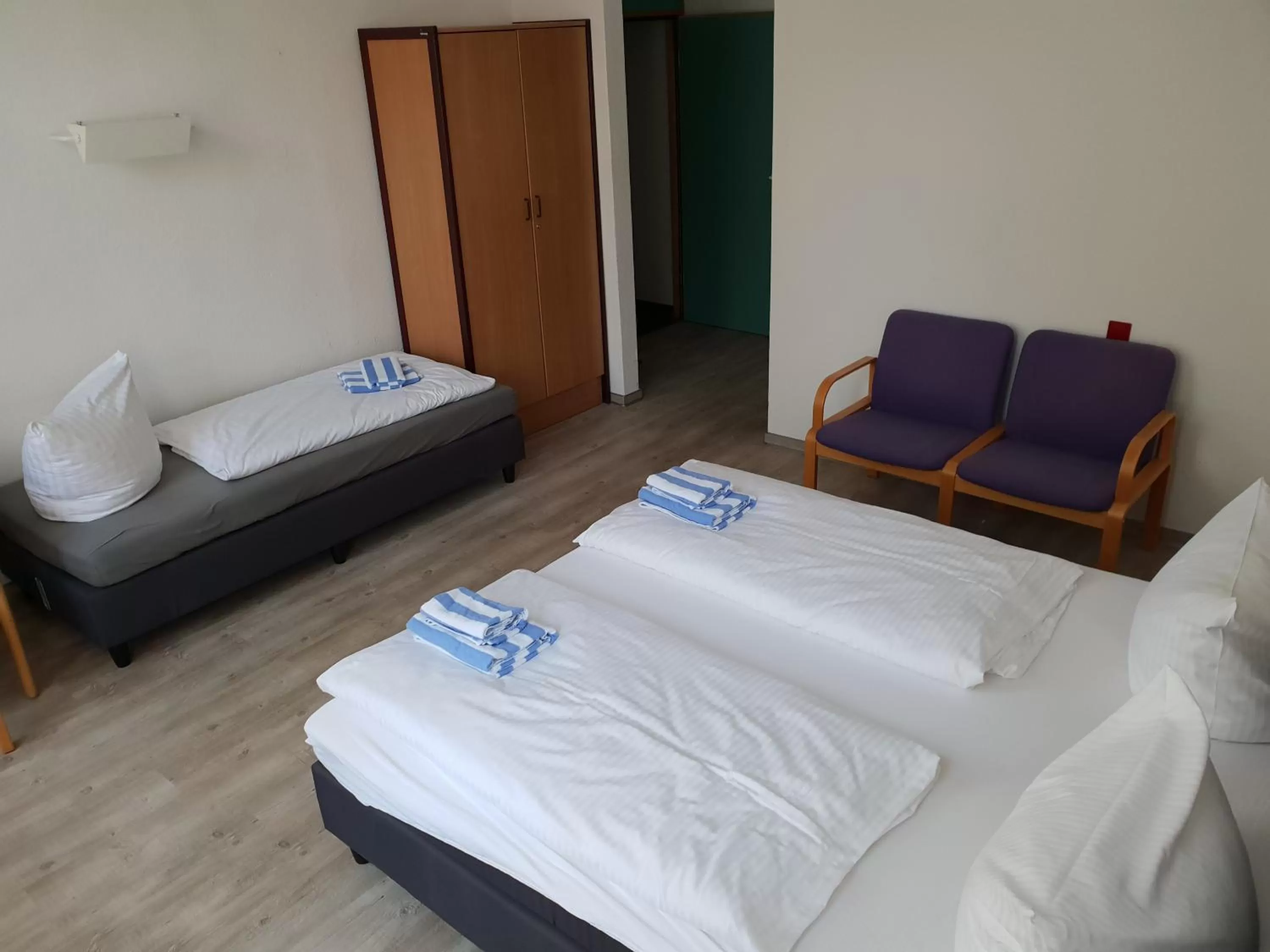 Bed in Appartement-Hotel Rostock