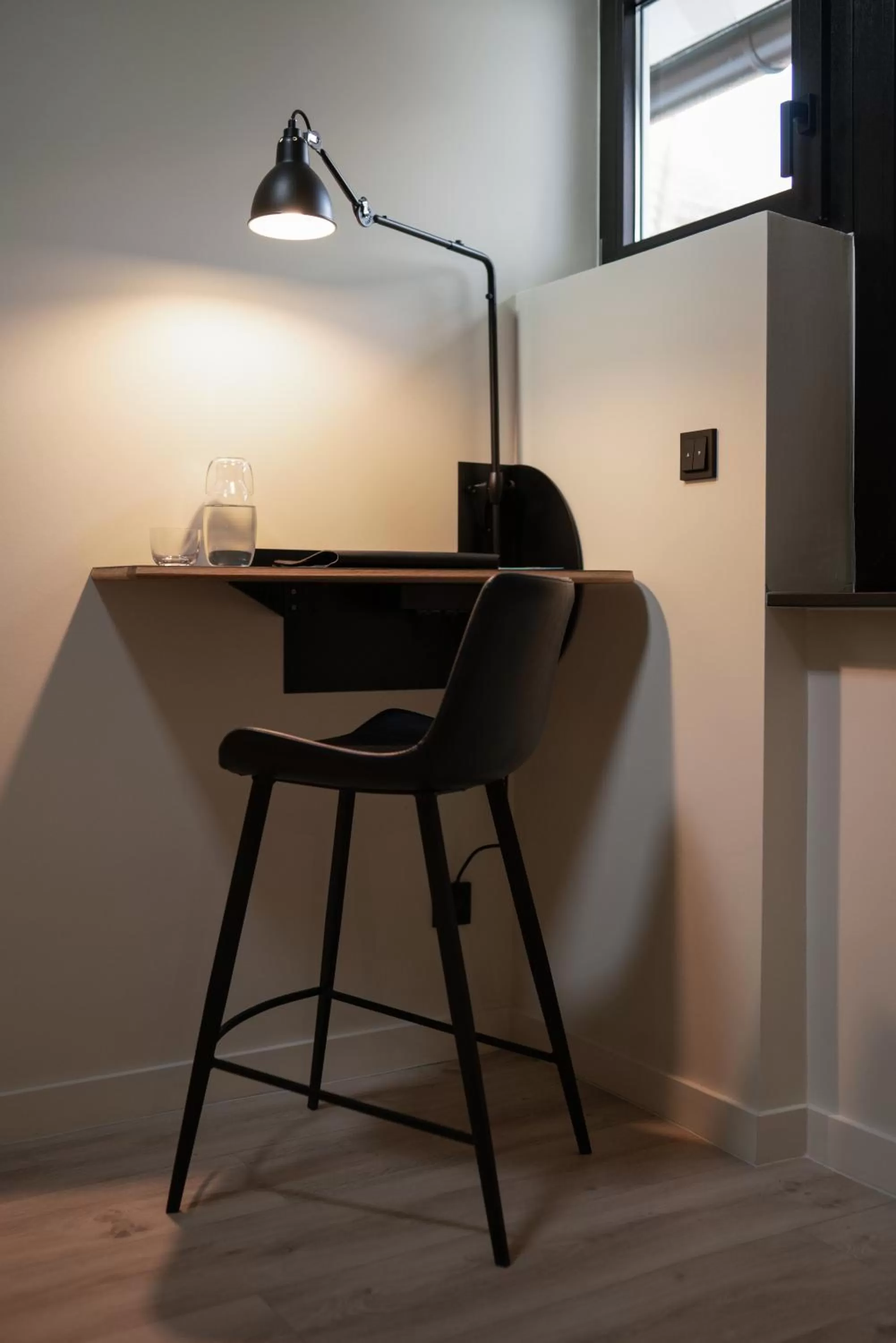 Seating area in THE ADAMS - Self Check In Hotel