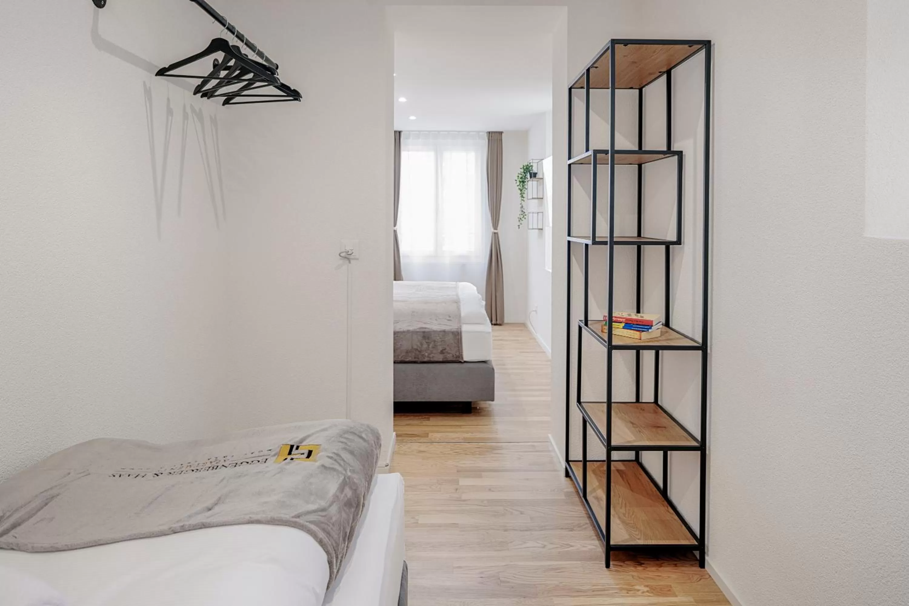 Bed in VISIMO Apartments St Georgen-Strasse St Gallen - Design City Nature