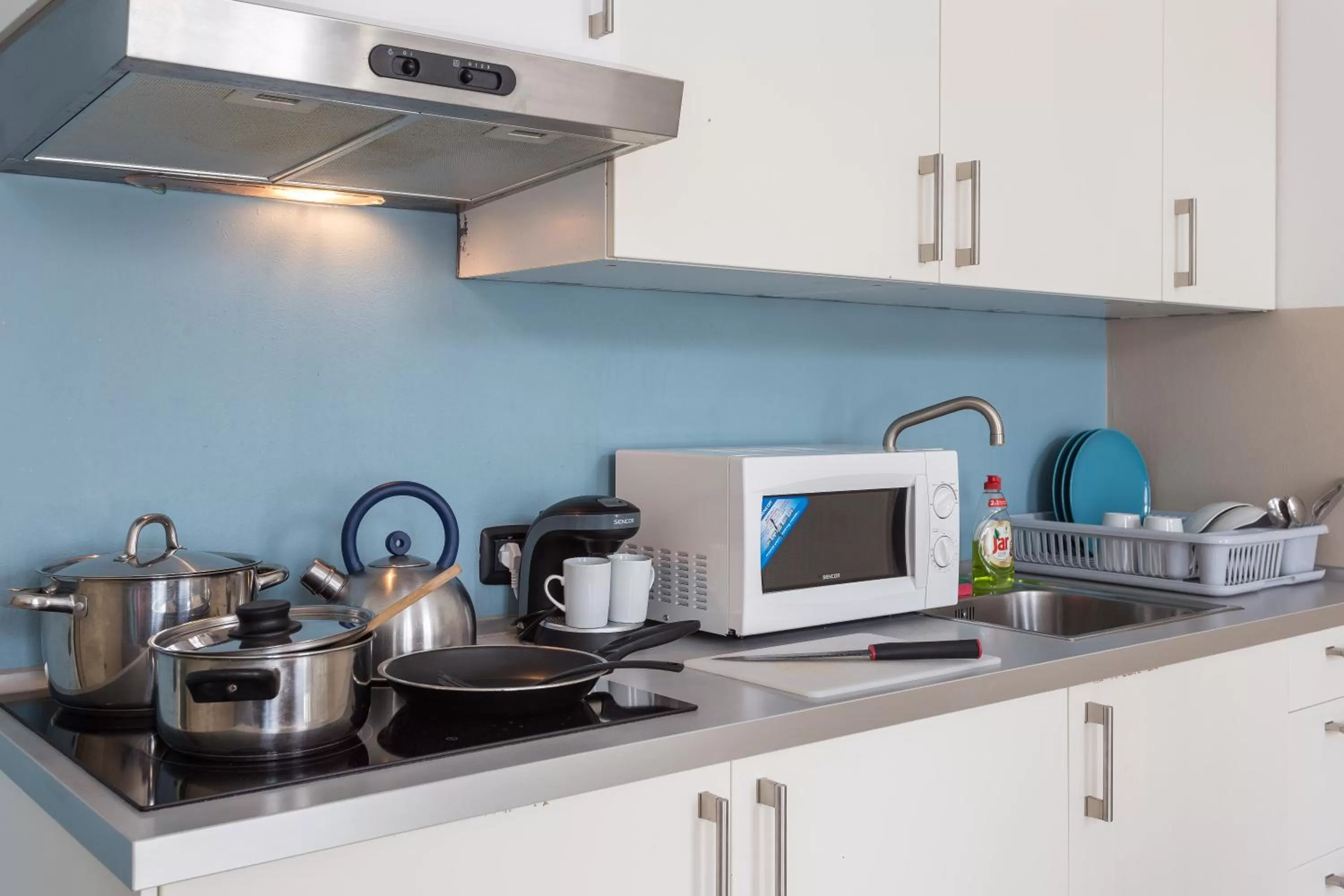 Coffee/tea facilities, Kitchen/Kitchenette in Legerova 33 Apartments