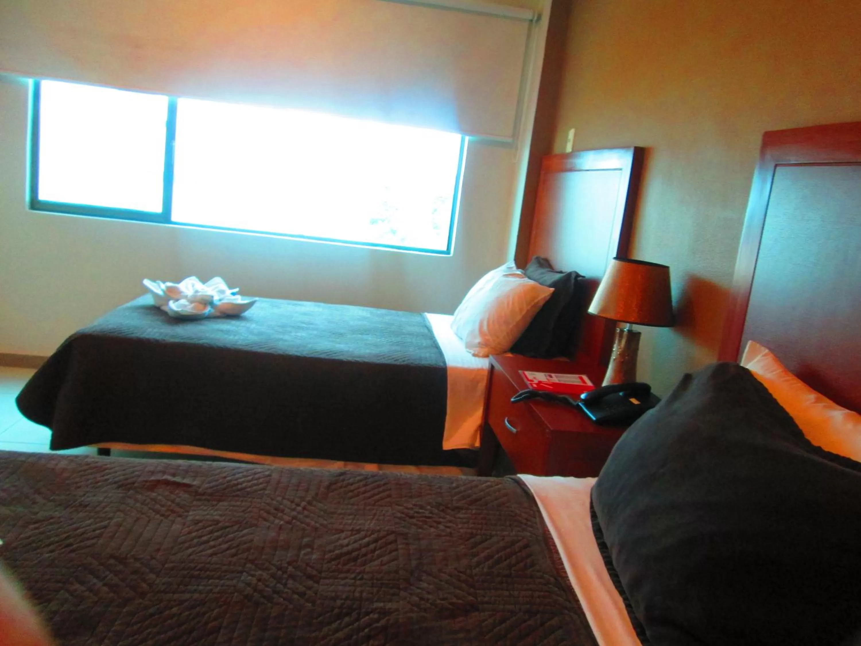 Bed in Hotel Garzota Inn