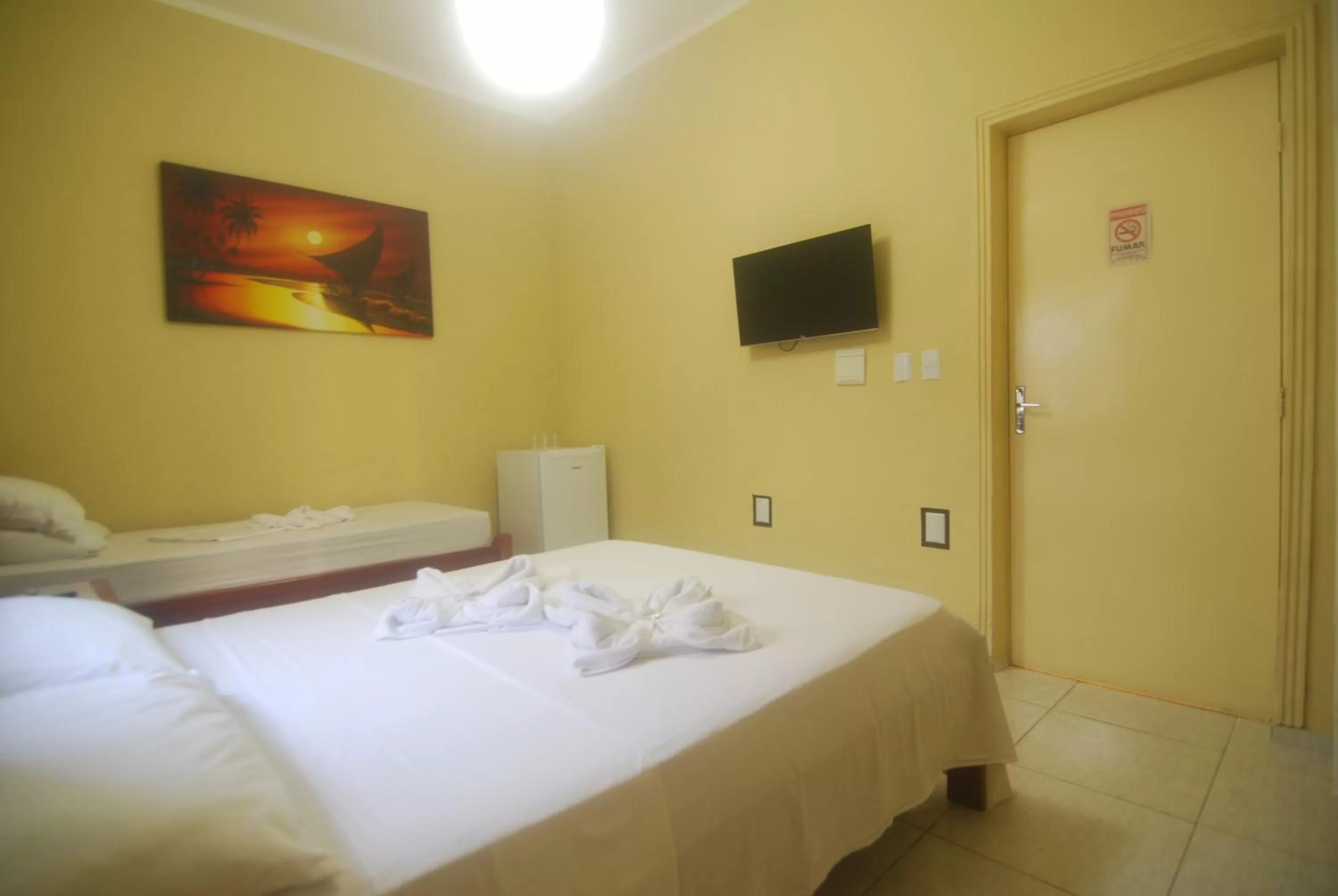 Bed in Refúgio Pousada Fortaleza