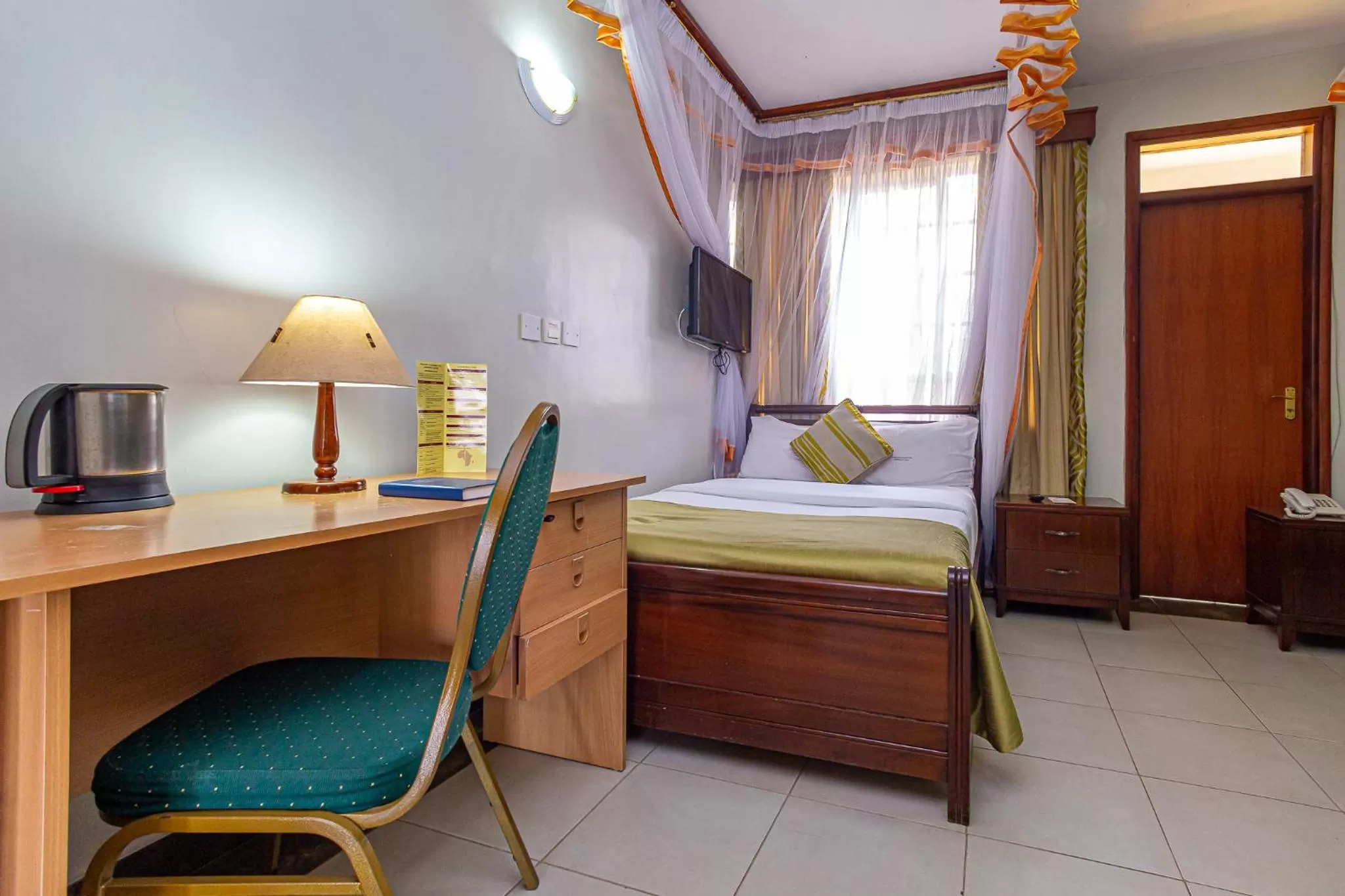 Photo of the whole room, Bed in Desmond Tutu Conference Centre