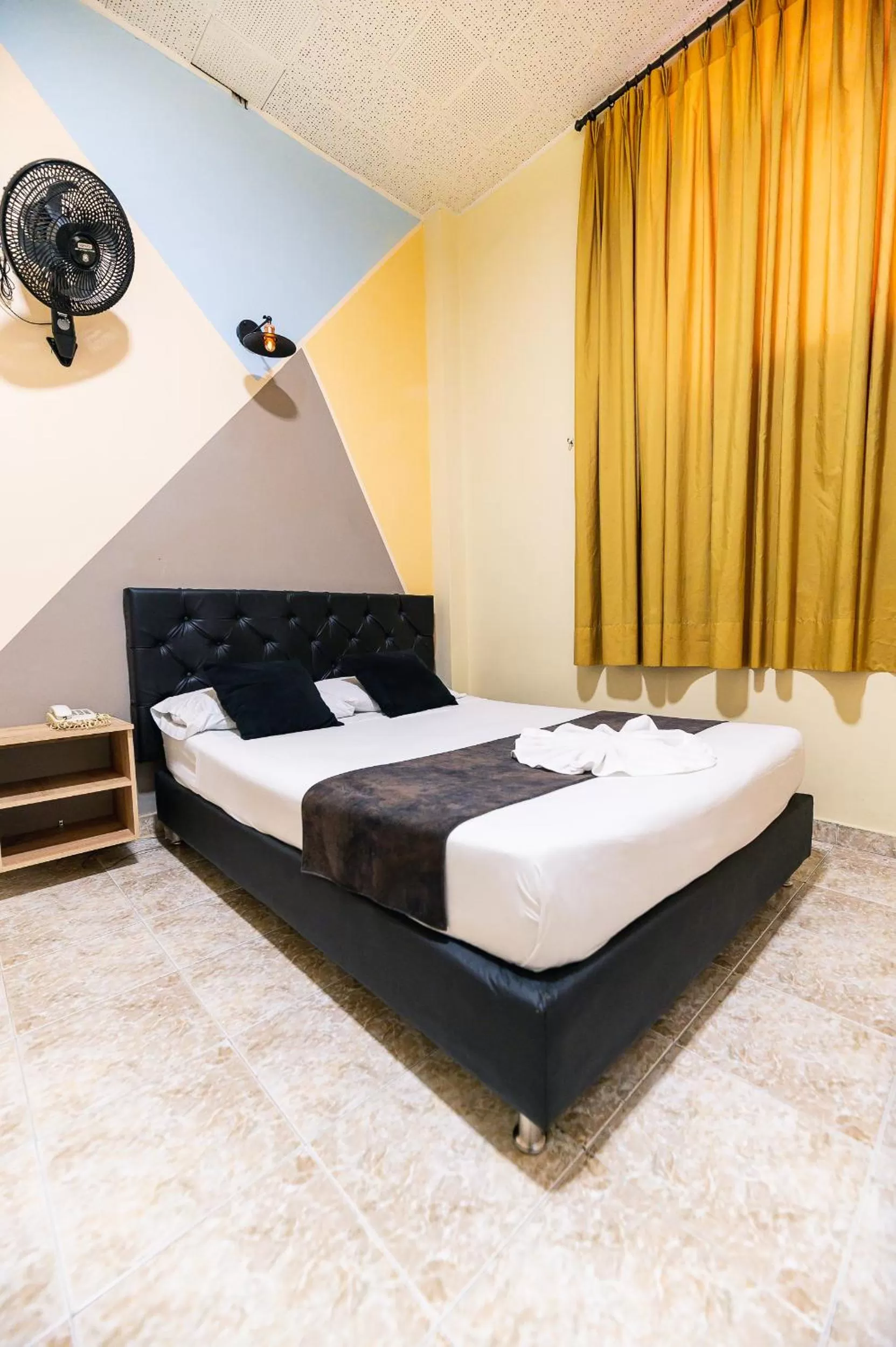 Bed in HOTEL CALLE REAL SUITE