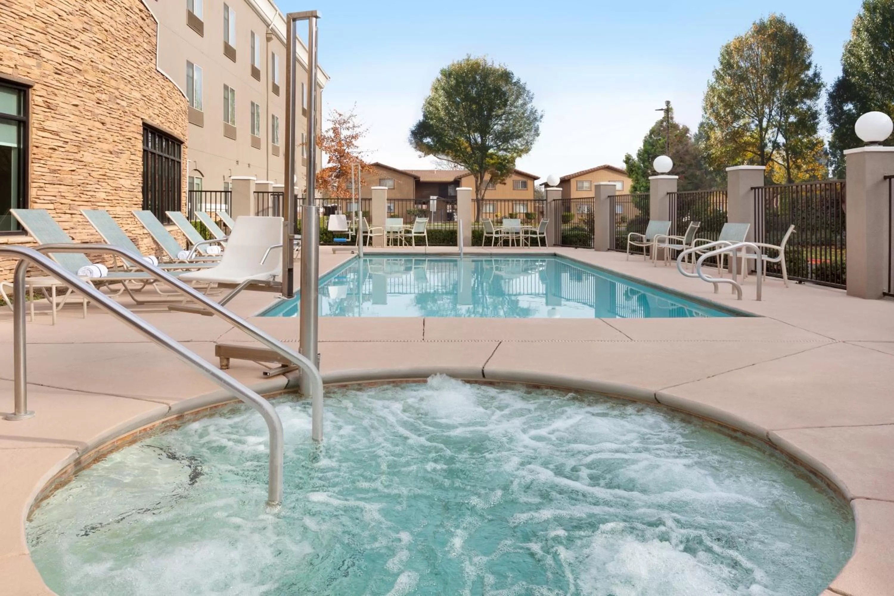 Swimming pool in Holiday Inn Express & Suites Merced - Yosemite Natl Pk Area by IHG