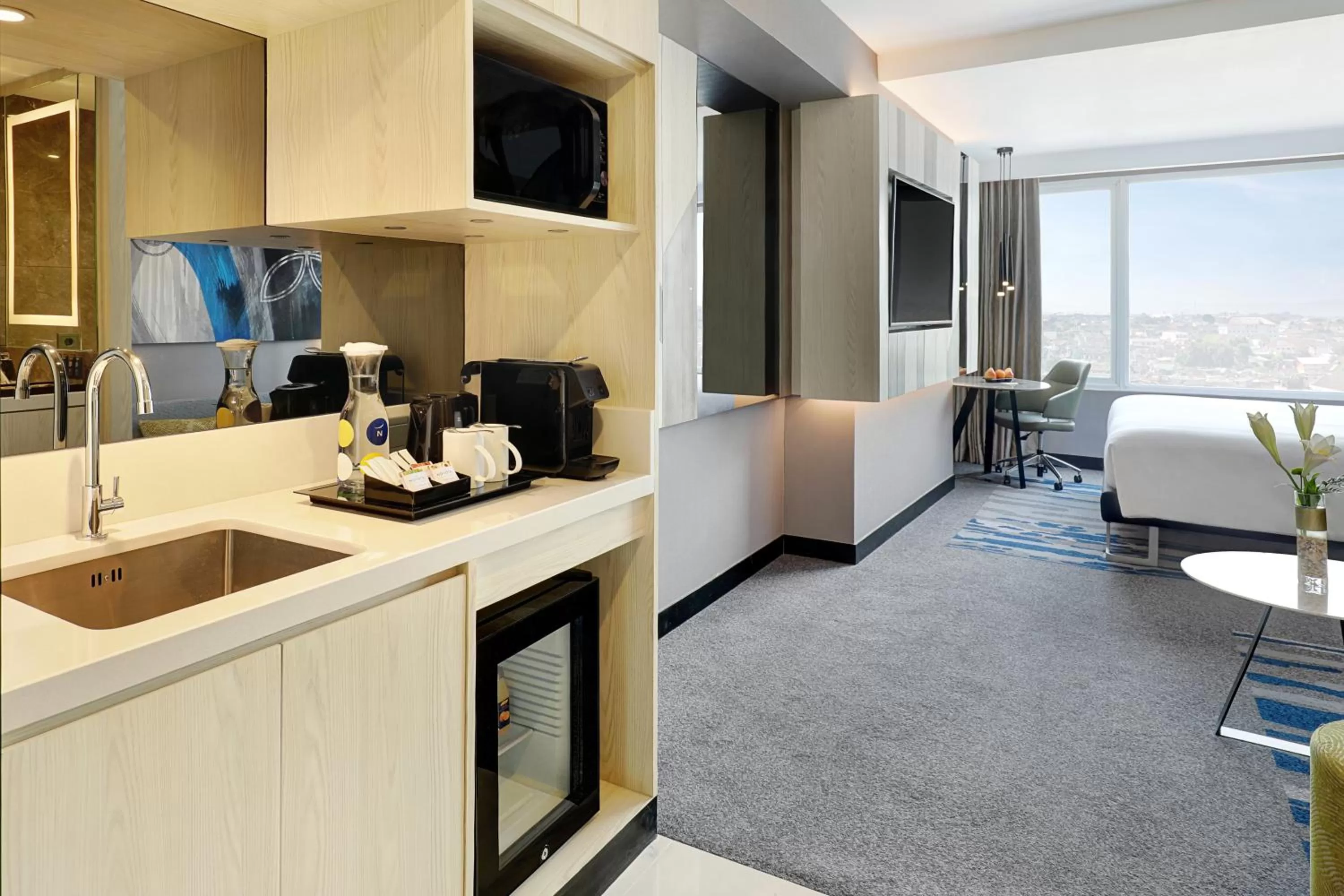 Kitchen or kitchenette in Novotel Suites Yogyakarta Malioboro