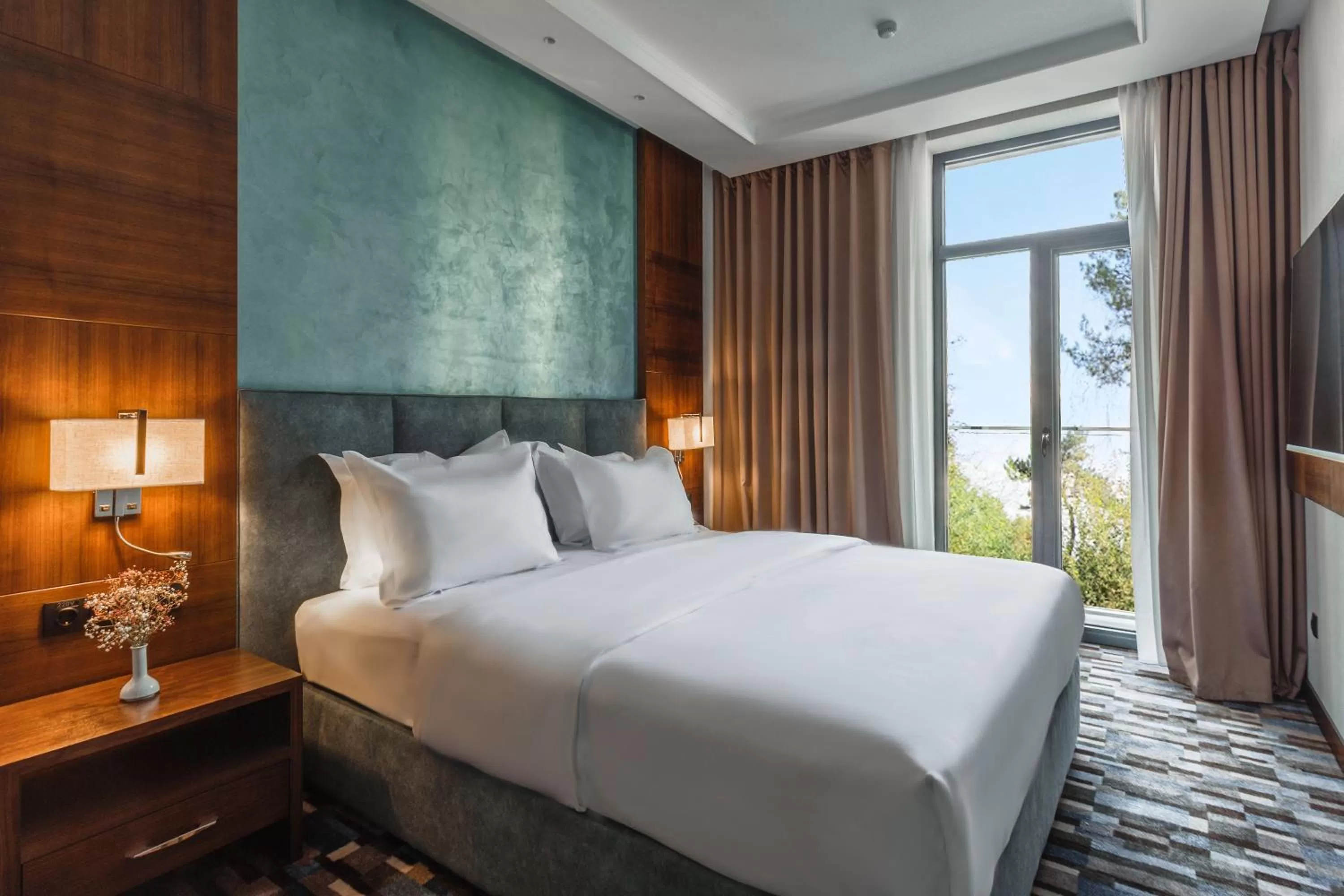 Photo of the whole room, Bed in ATECA Hotel Suites Tashkent