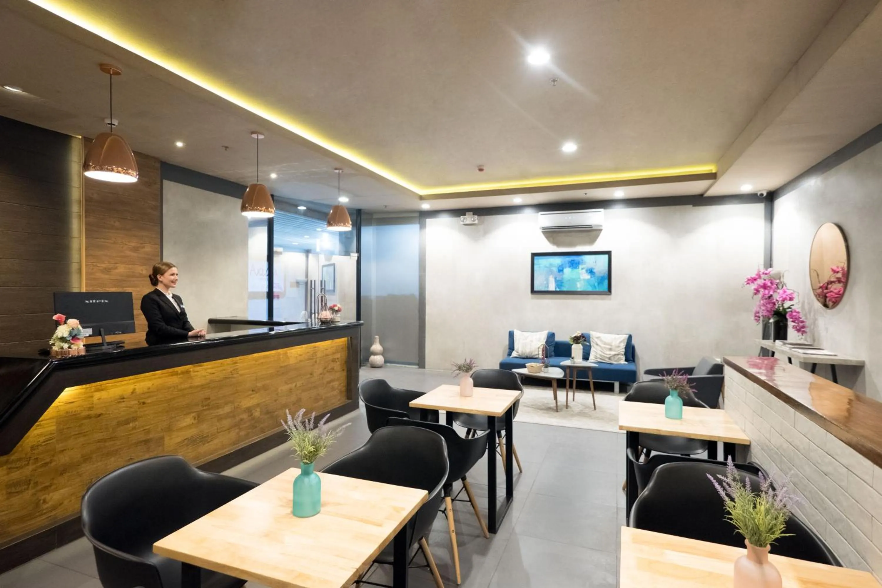 Lobby or reception in Axiaa Hotel