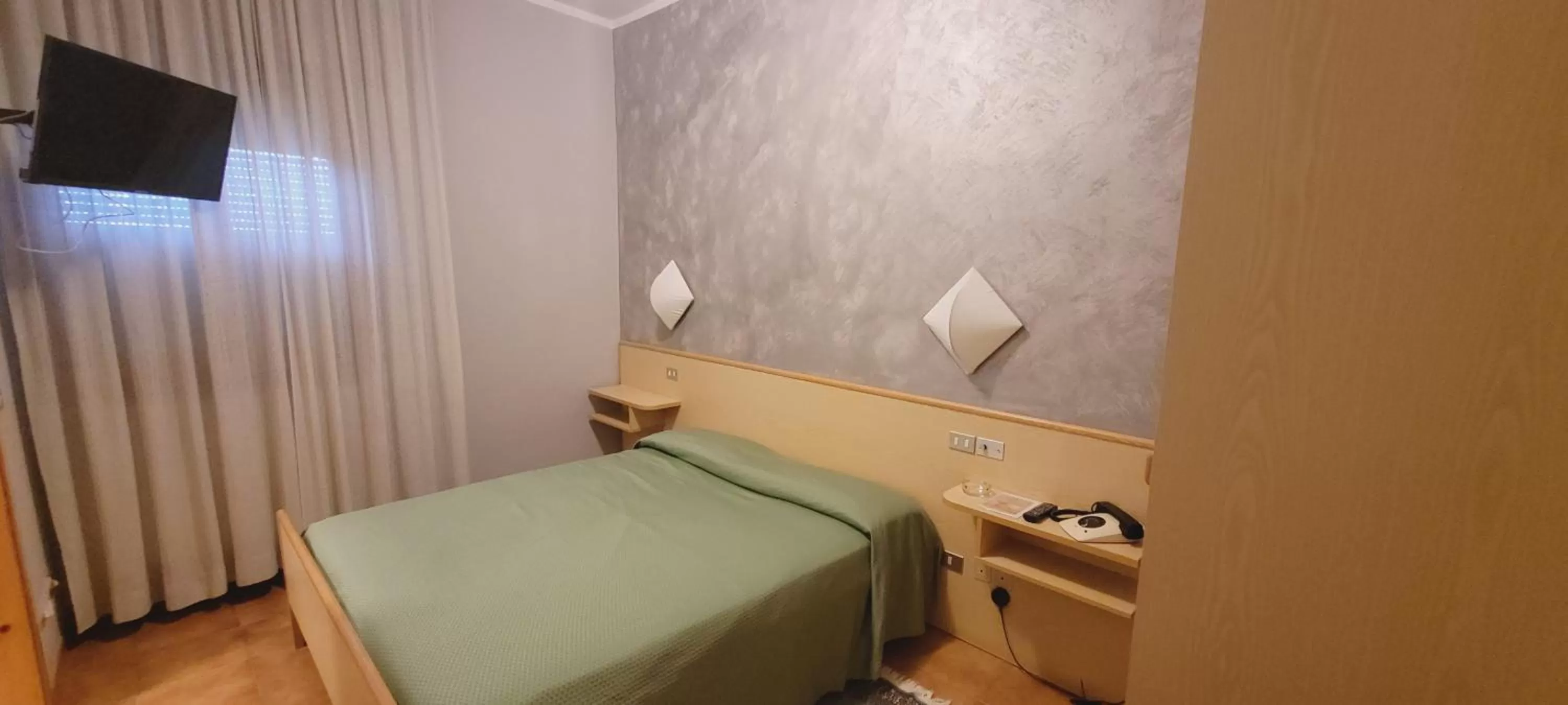 Bedroom in HOTEL PARADISO