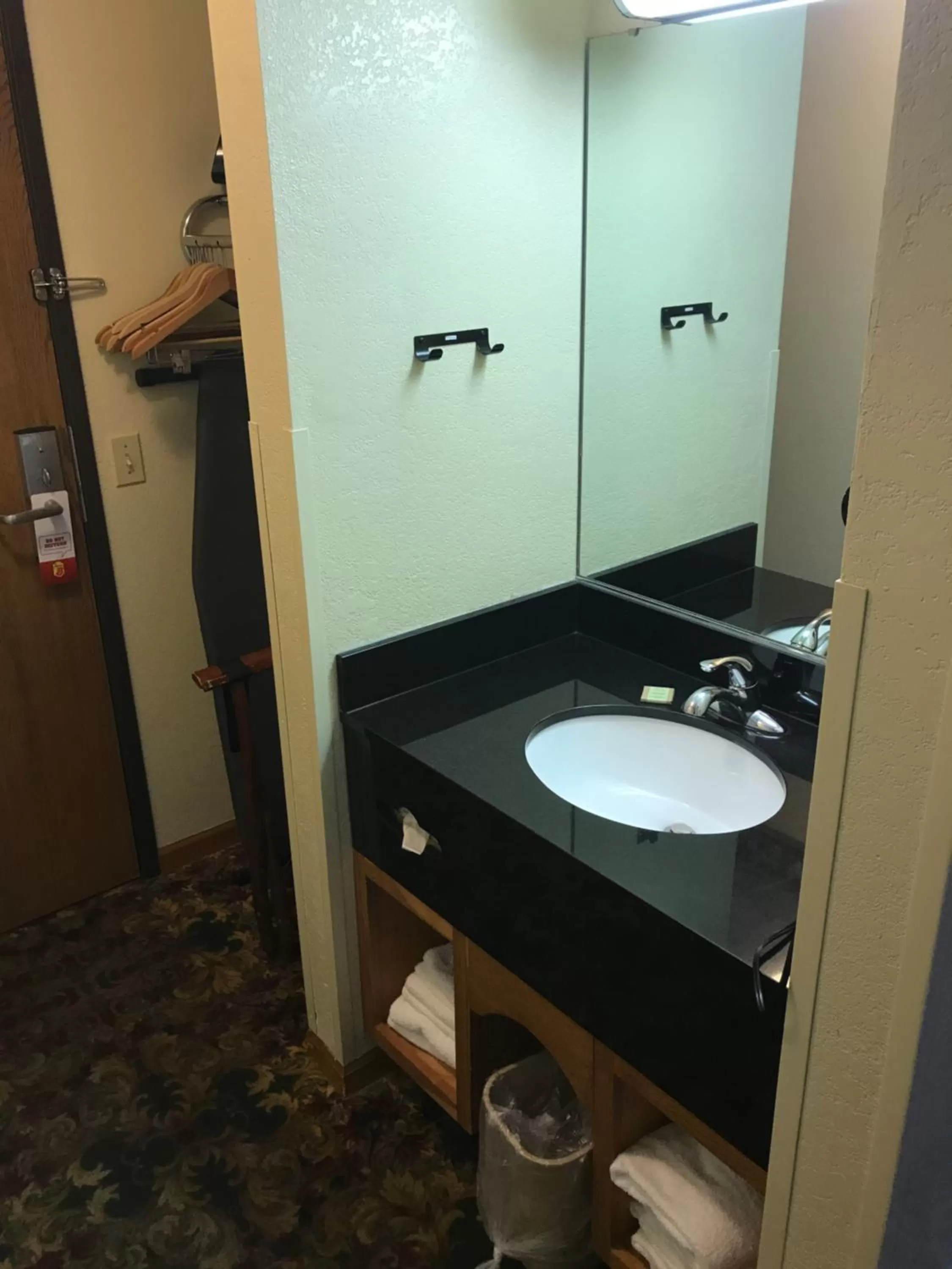 Bathroom in Super 8 by Wyndham Bridgeview of Mackinaw City