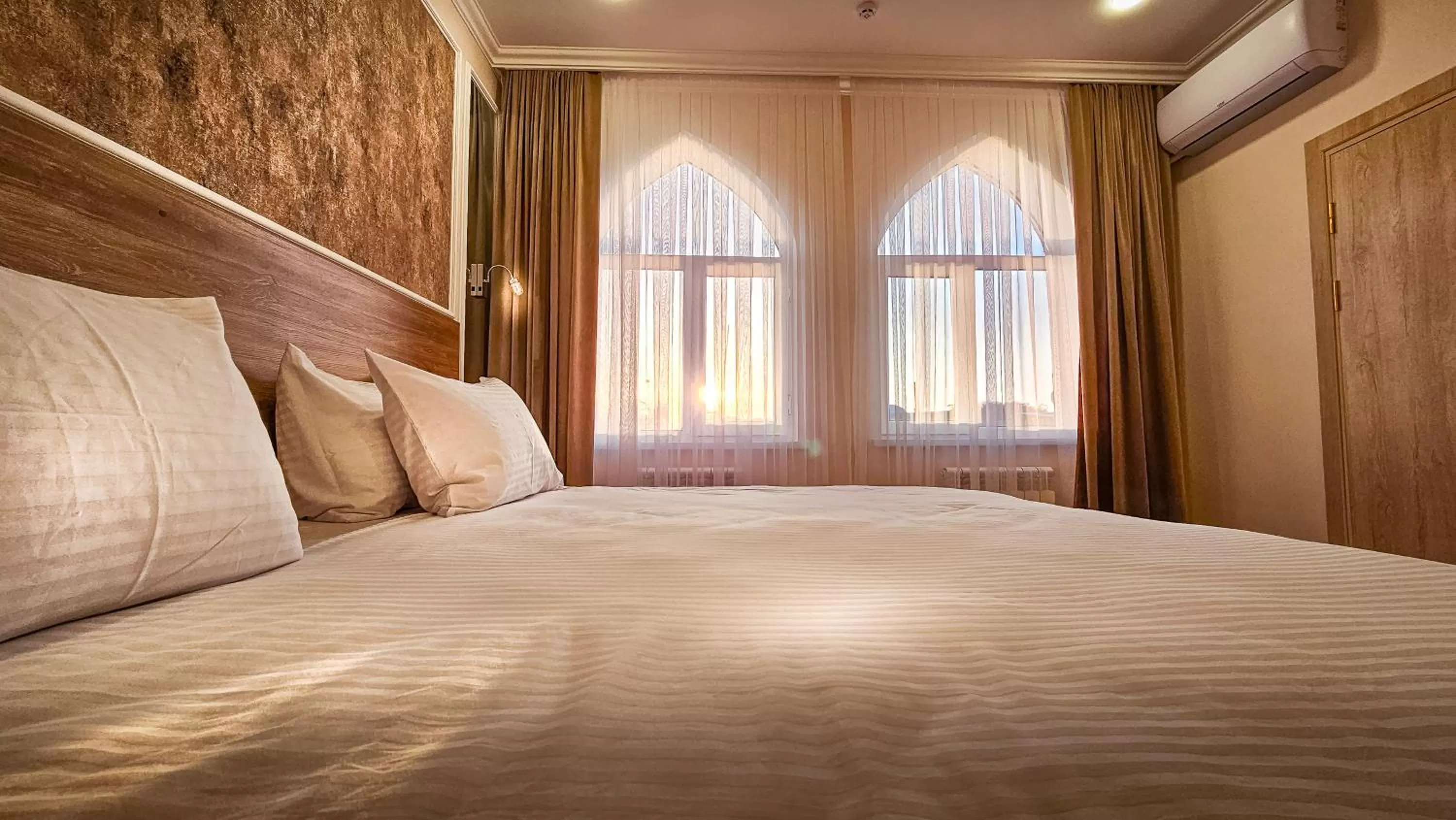 Bed in Hotel Bankir Khiva