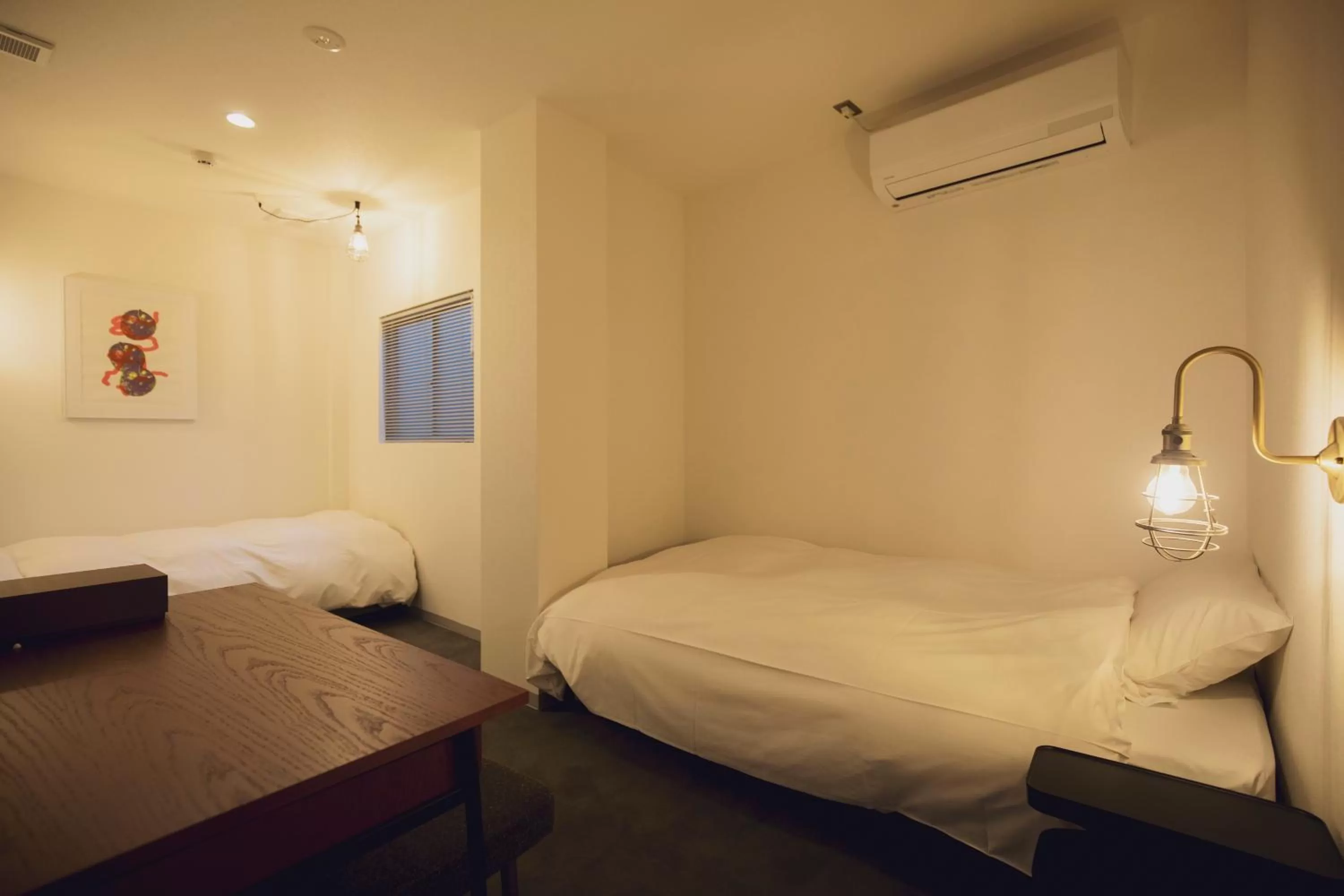 Bed in BENJAMIN HOTEL KANAZAWA