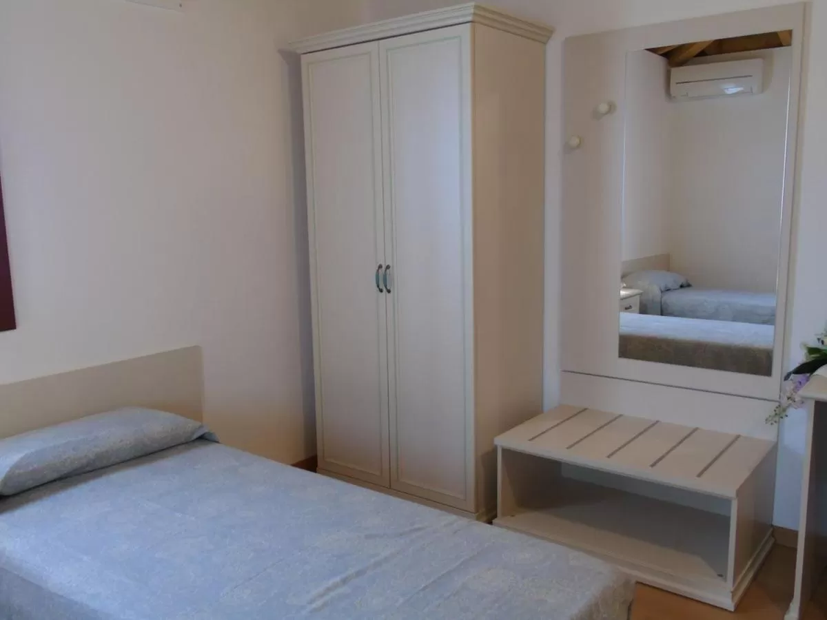Bed in B&B Ai Cipressi