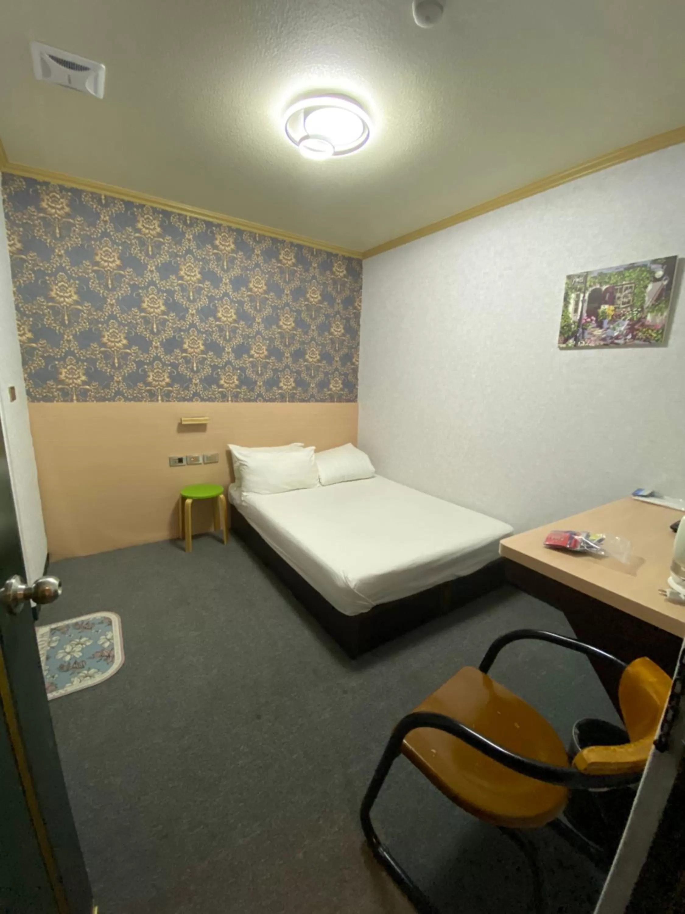 Photo of the whole room, Bed in Rich Zone Hotel