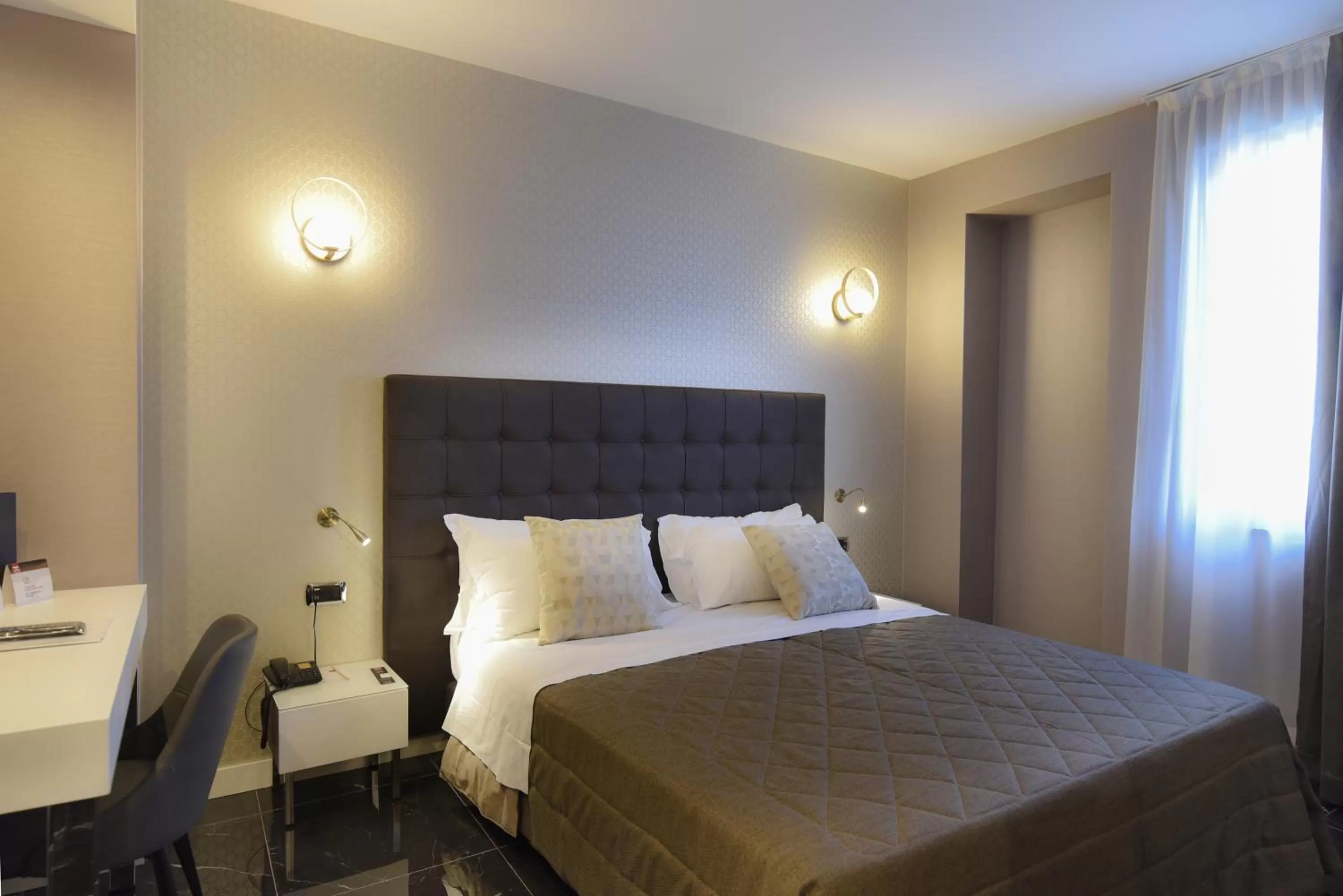 Bed in Magri's Hotel