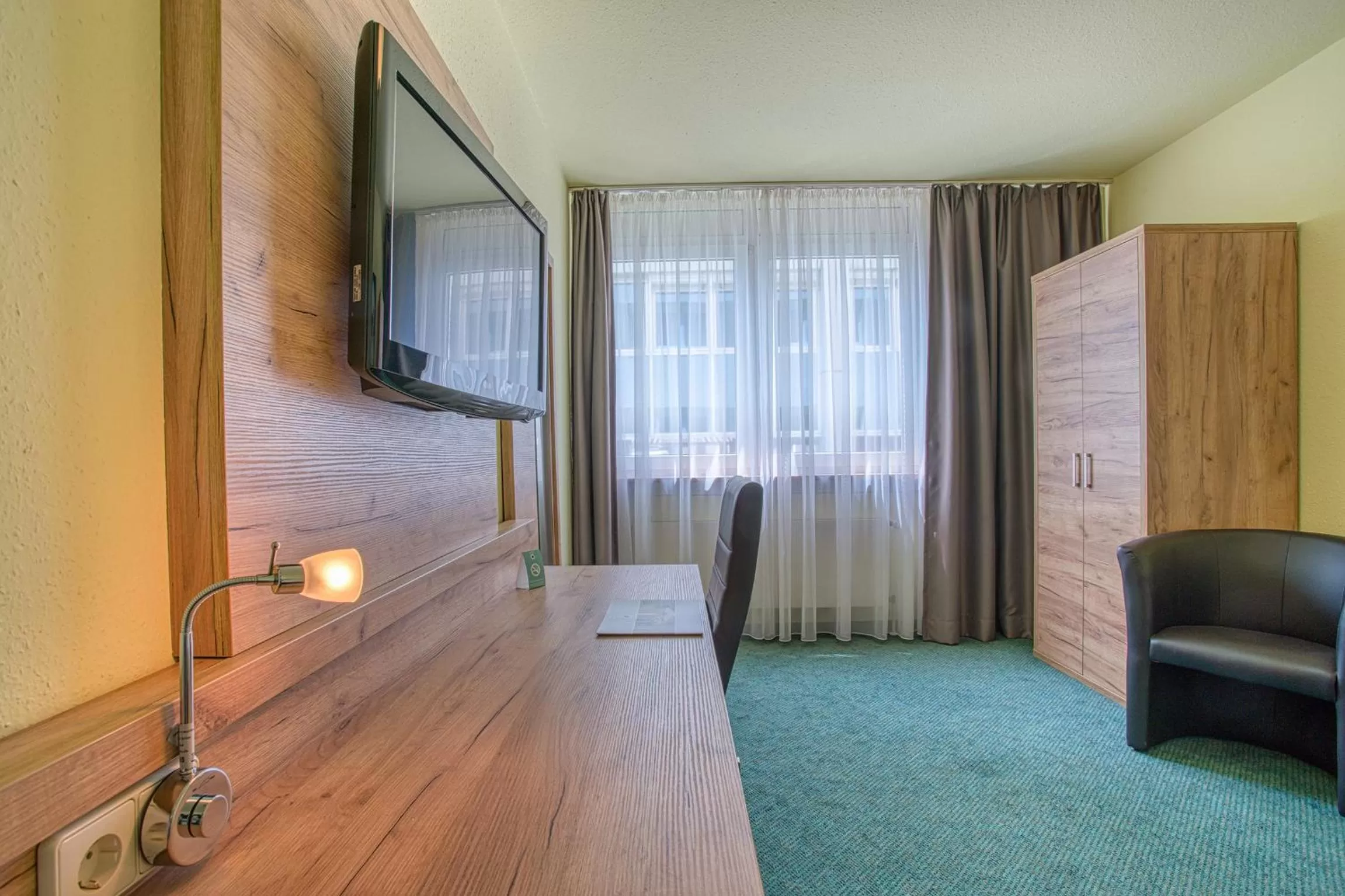 Decorative detail, Bed in Centro Hotel Böblingen, Trademark Collection by Wyndham