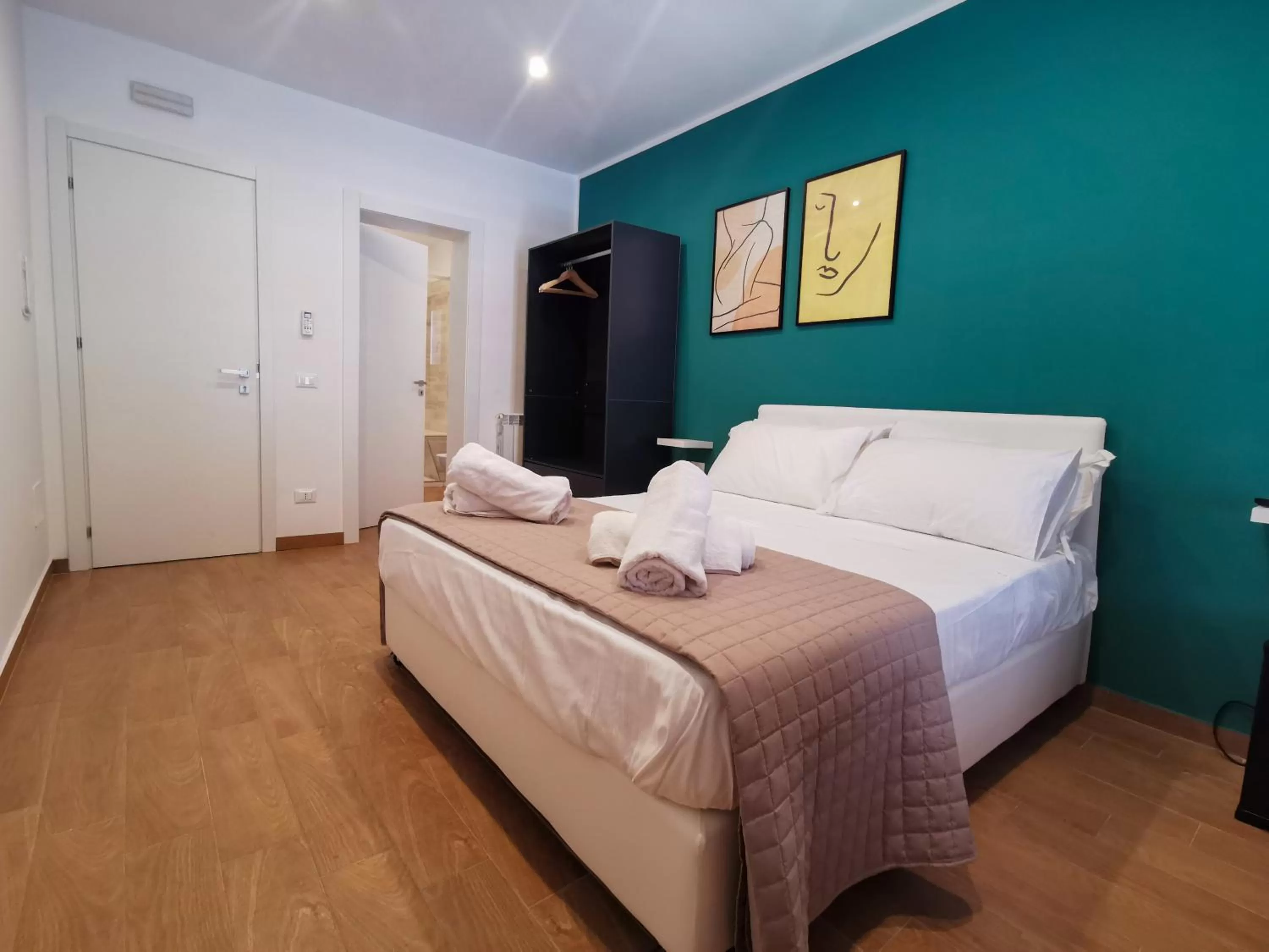 Bed in Verdirooms158