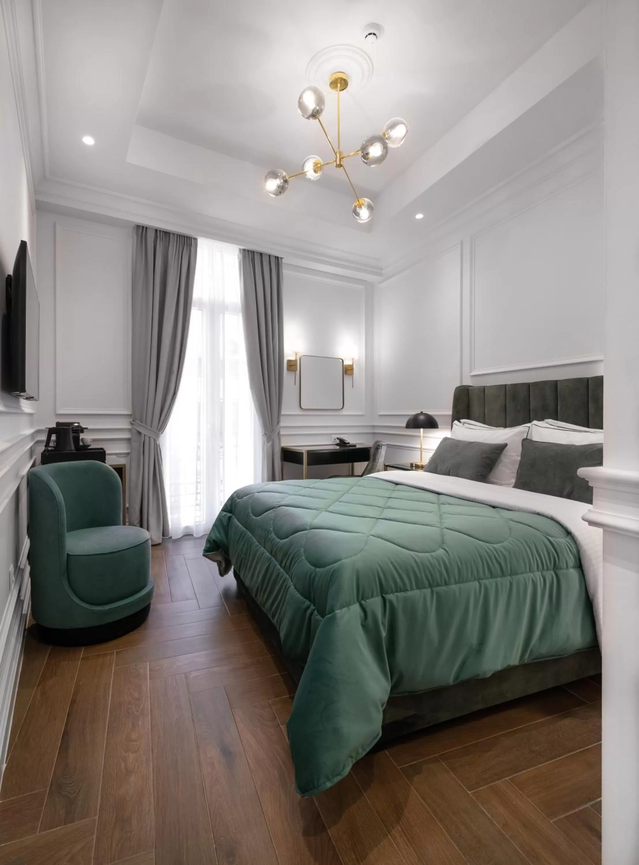 Bed in Praxitelous Luxury Suites