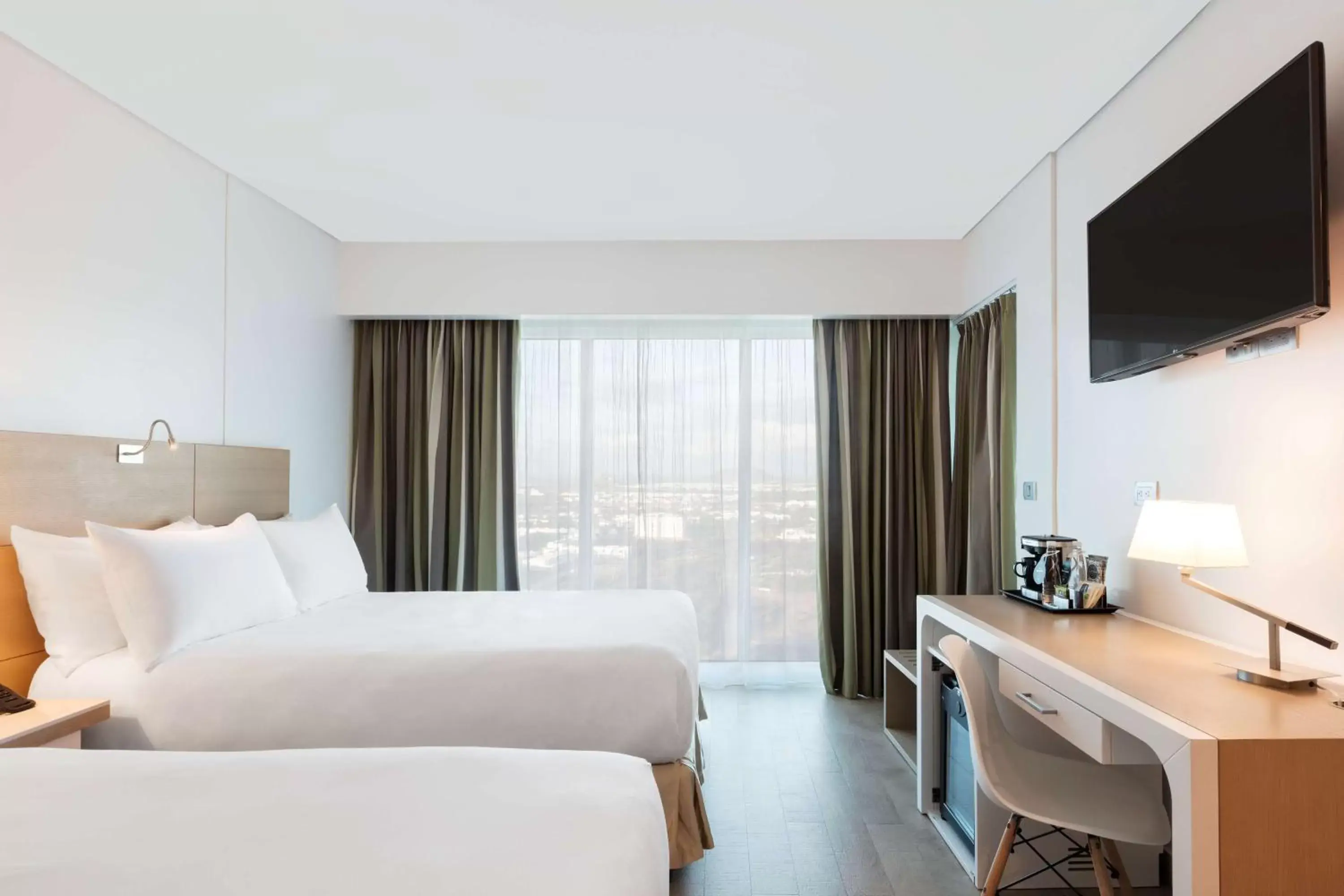 Deluxe Double Room with Two Double Beds and City View in DoubleTree by Hilton Mazatlan, SIN Deluxe Double Room with Two Double Beds and City View in DoubleTree by Hilton Mazatlan, SIN