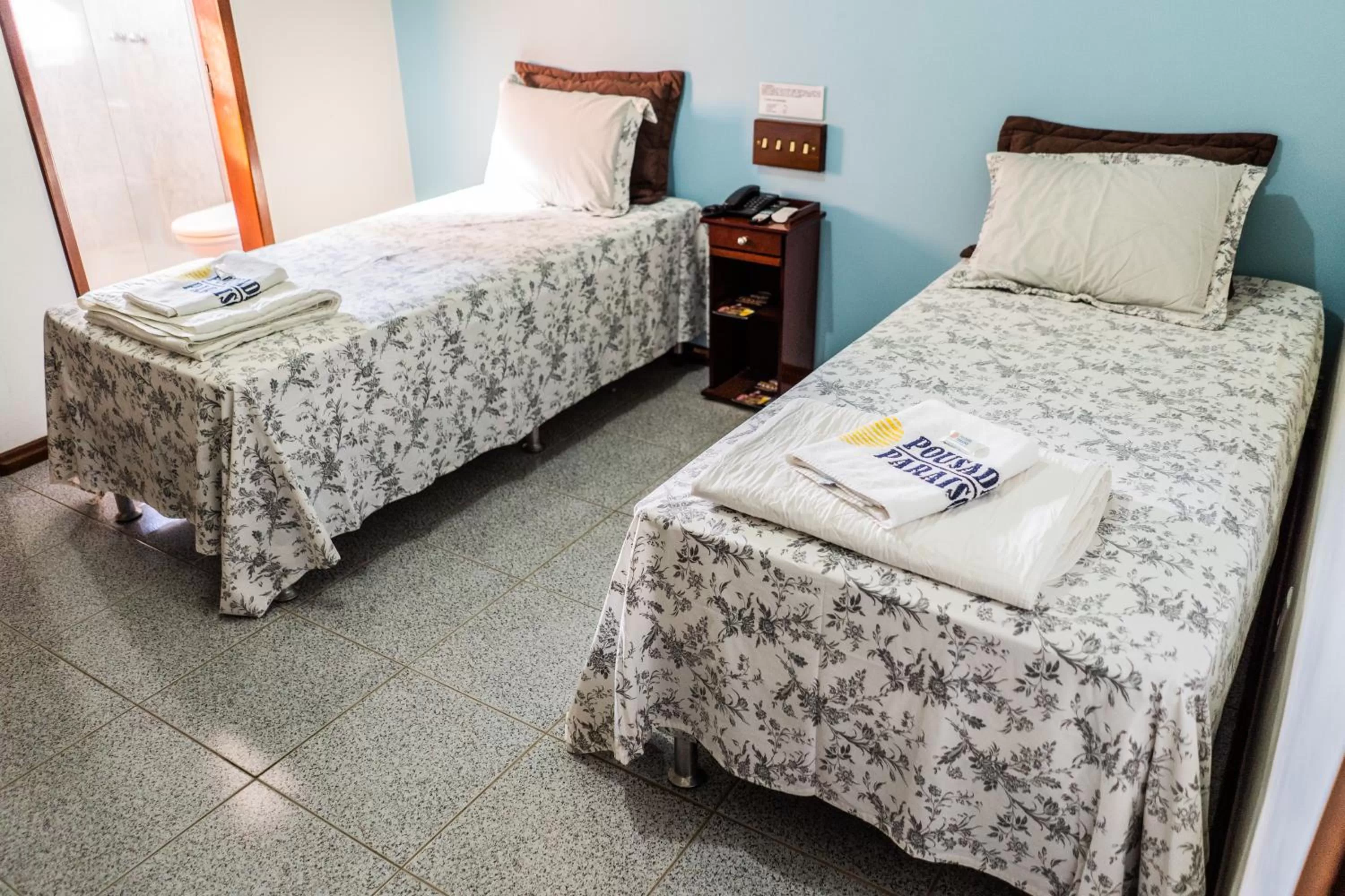 Bed in Pousada Paraiso