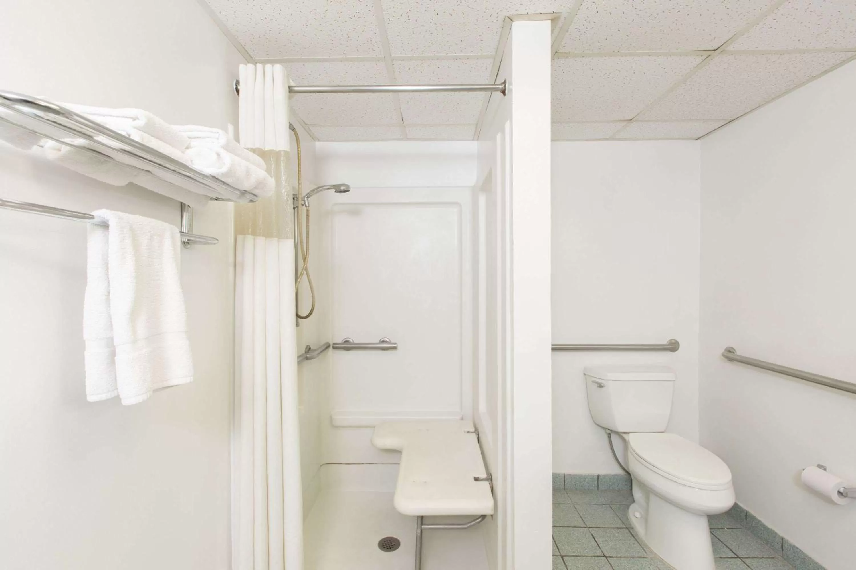 Bathroom in Travelodge by Wyndham Great Bend