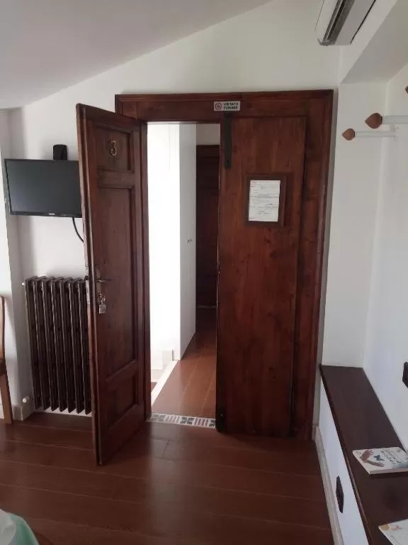 Bedroom, TV/Entertainment Center in Residence Tucci