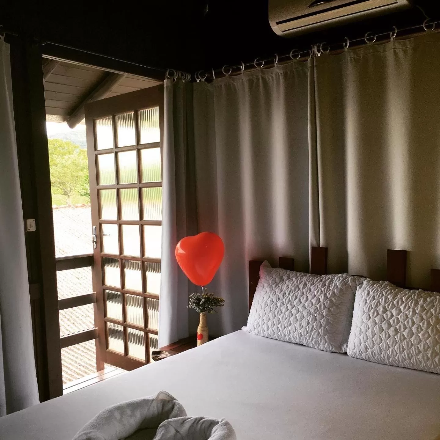 Bed in Pousada Quatro Estrelas