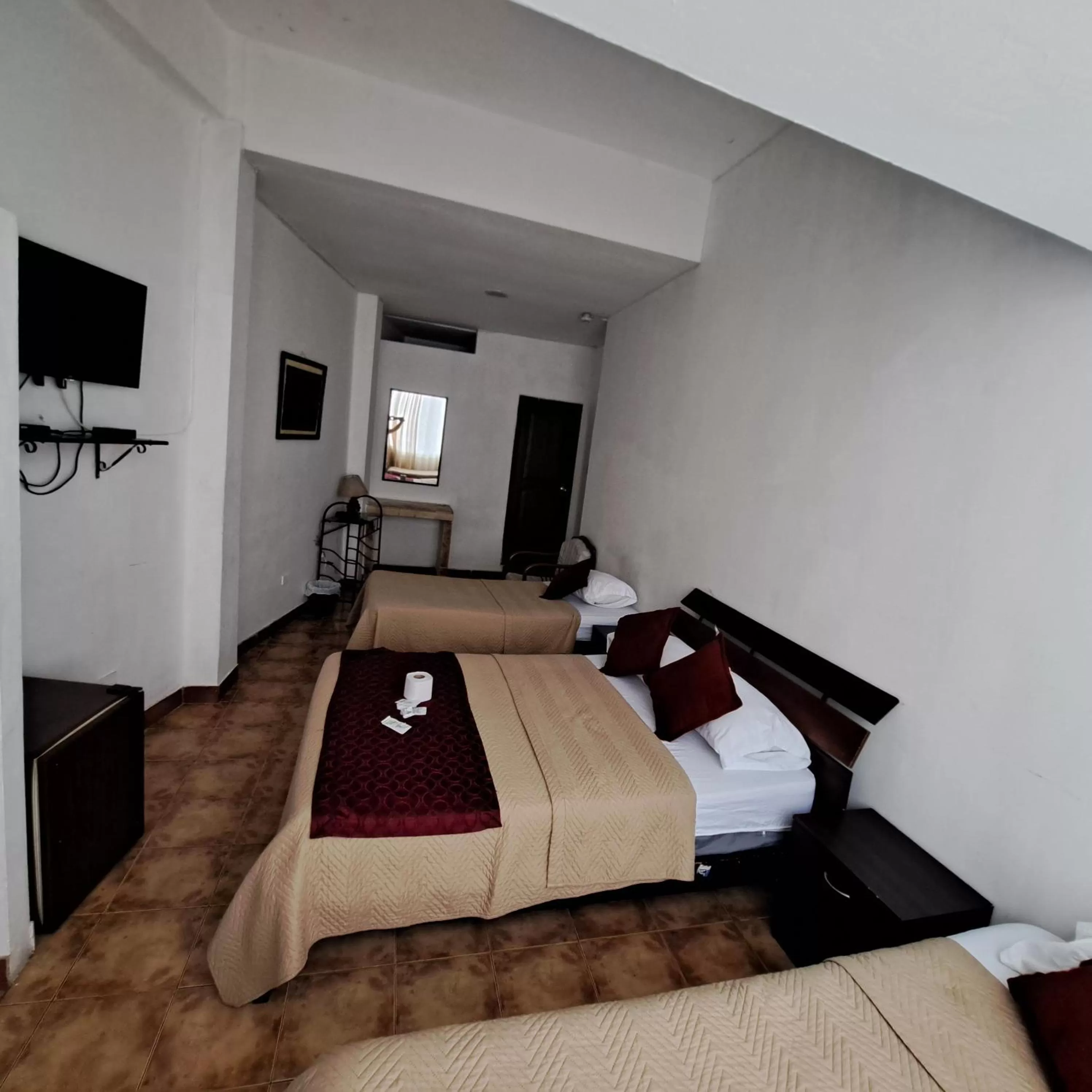 Photo of the whole room, Bed in Atlantic Suites Hotel