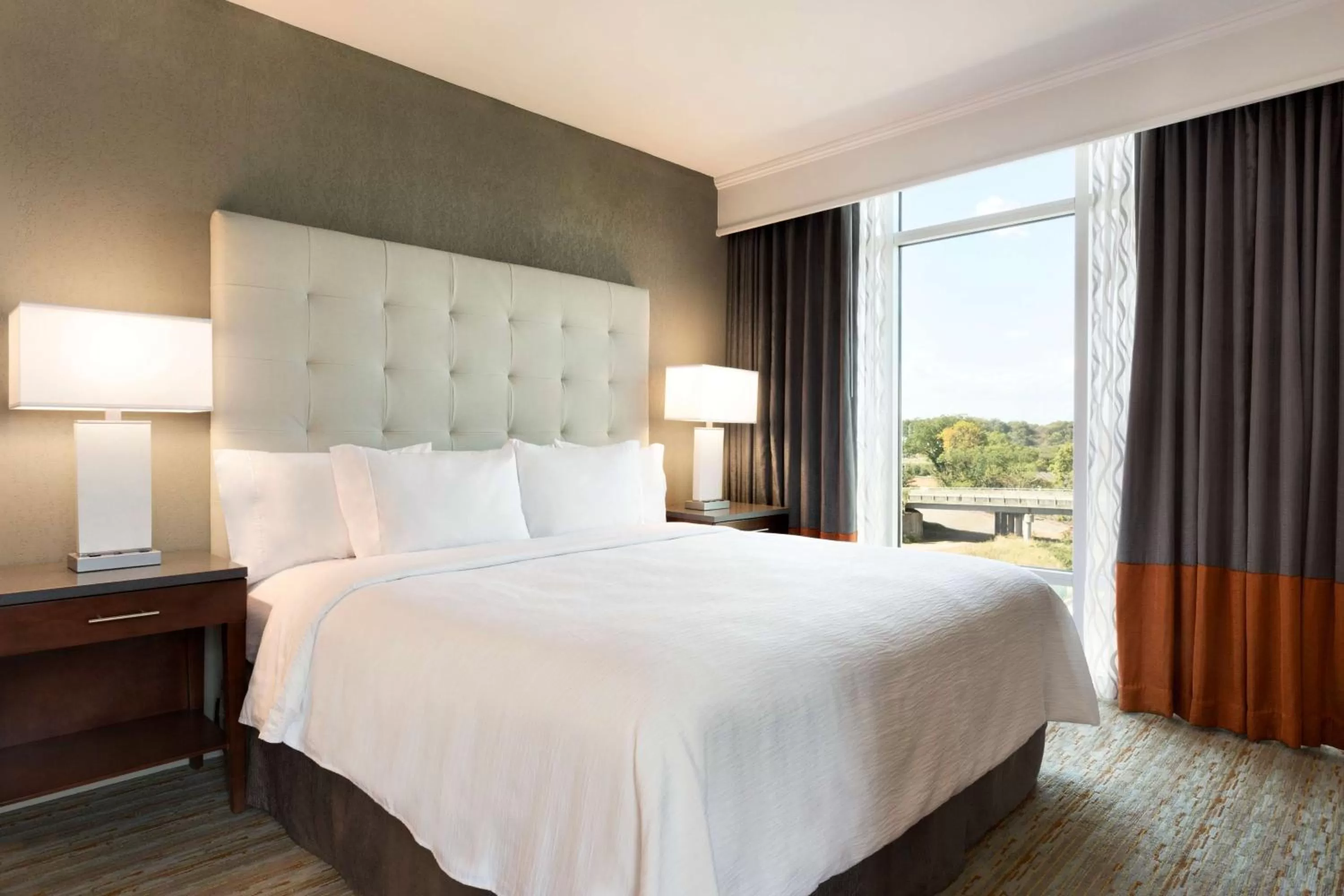 Two-Room King Suite with Balcony - Hearing Accessible in Embassy Suites by Hilton Greenville Downtown Riverplace
