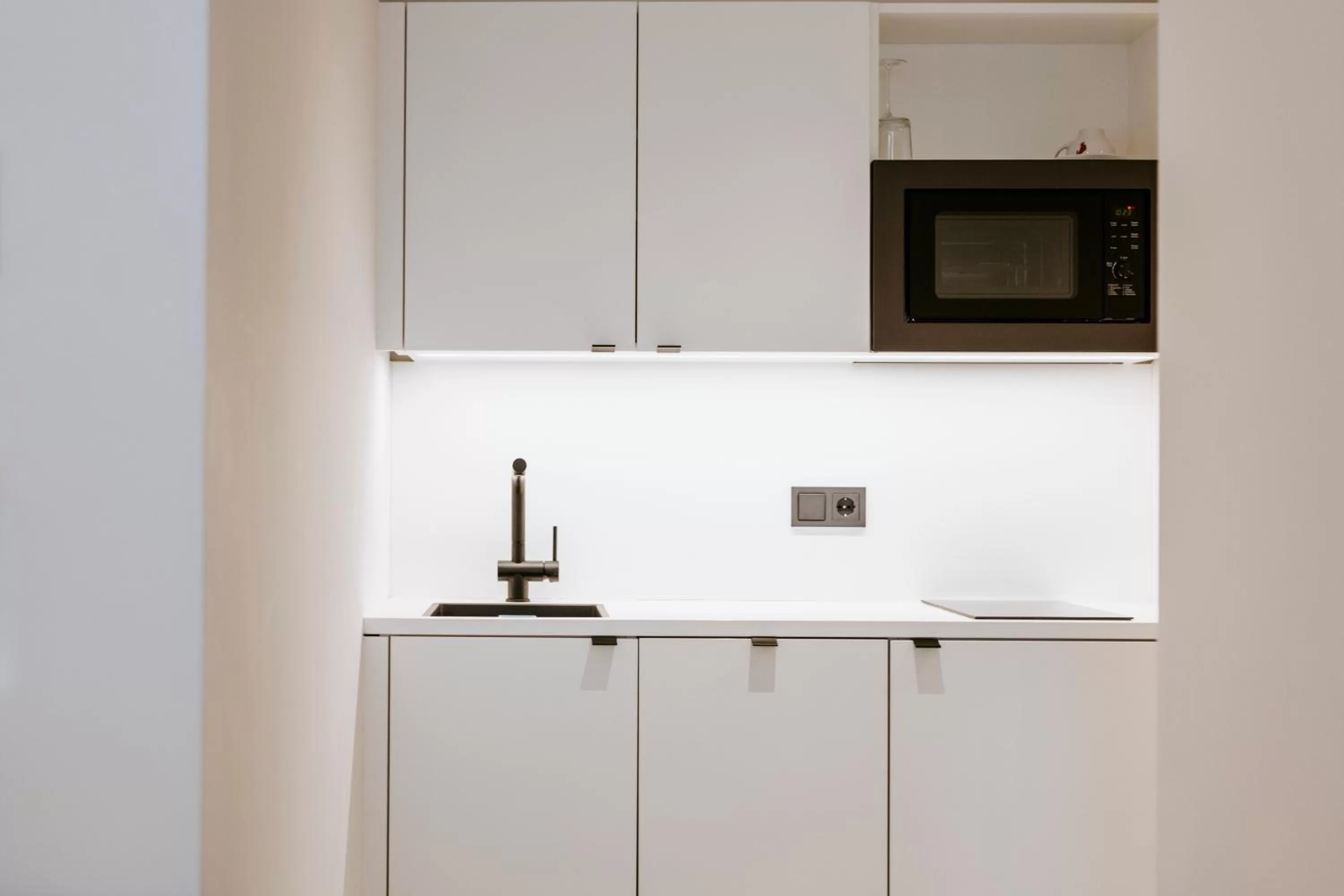 Kitchen or kitchenette, Kitchen/Kitchenette in ART-INN Design Self-Check-in-Hotel