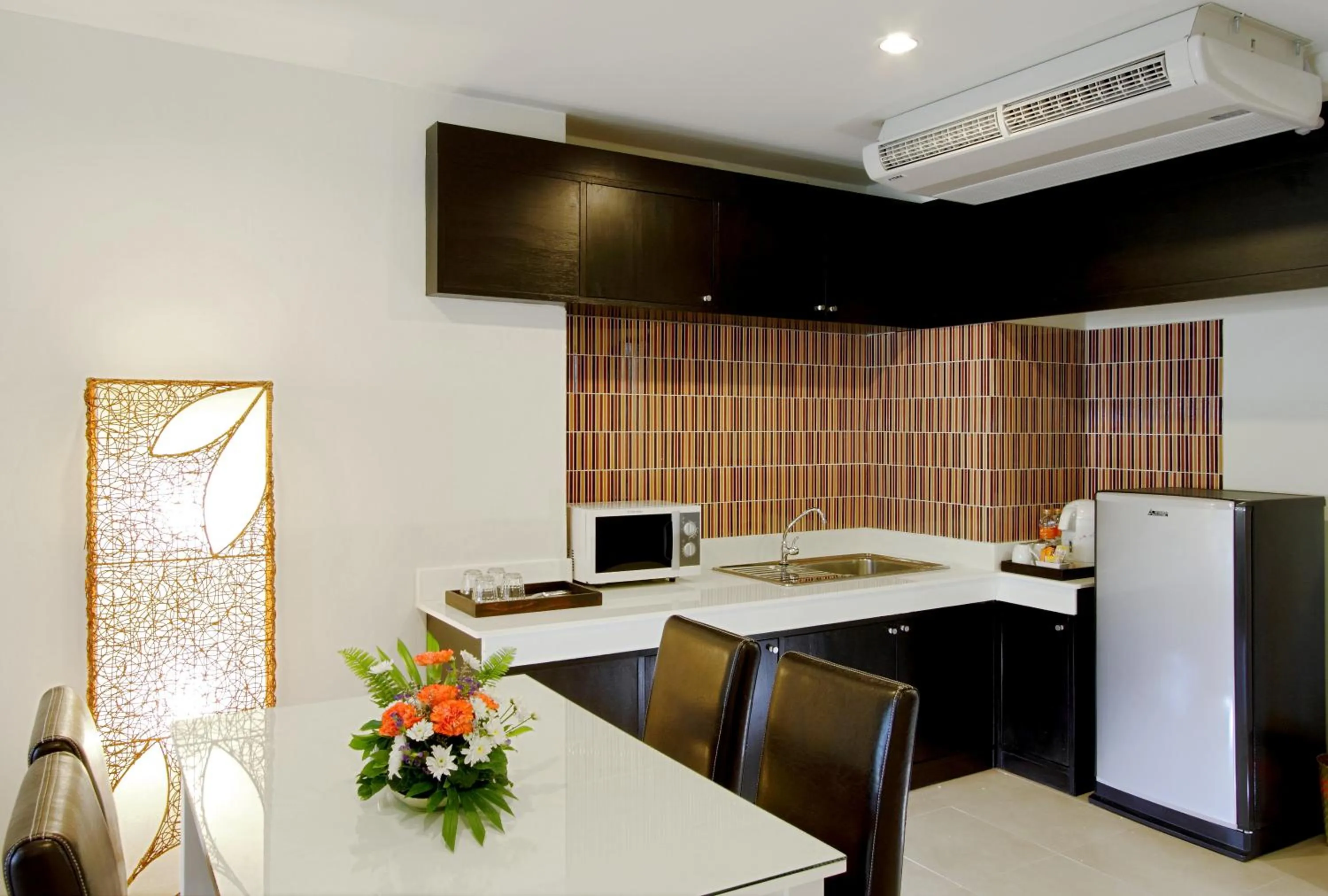 Kitchen or kitchenette in Kata Sea Breeze Resort - SHA Plus