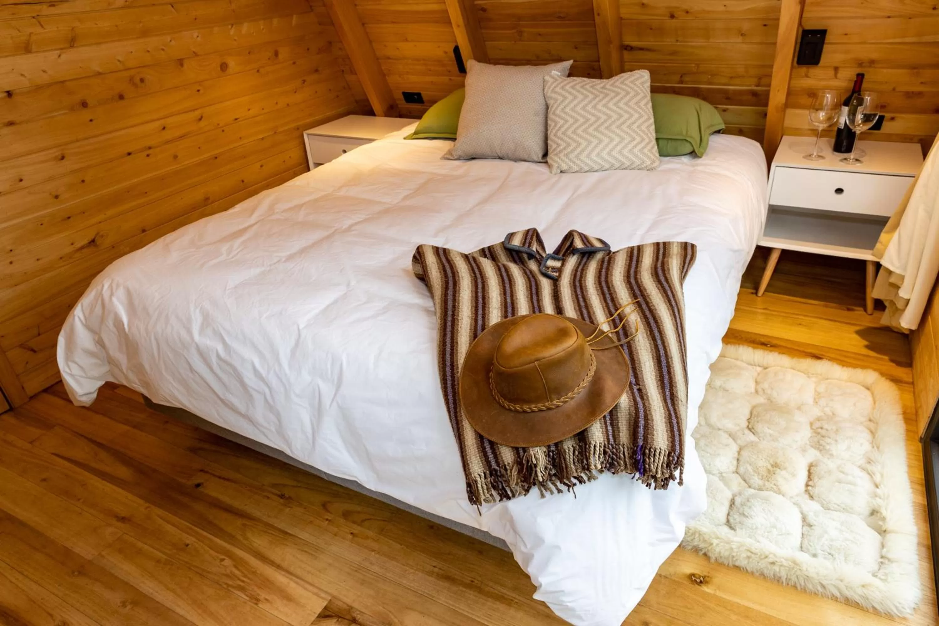 Bed in Hosteria Papagayo Cotopaxi