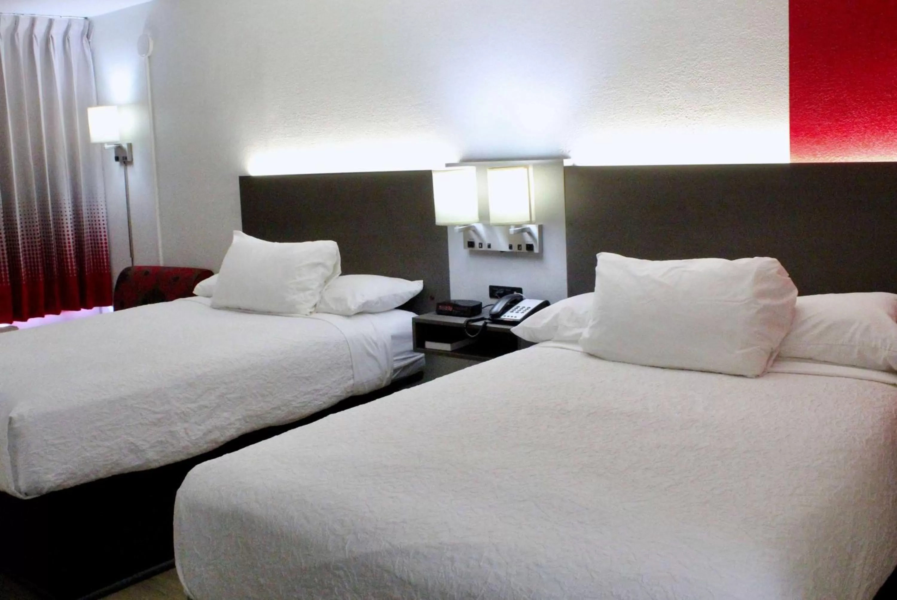 Photo of the whole room, Bed in Ramada by Wyndham Harrisonburg