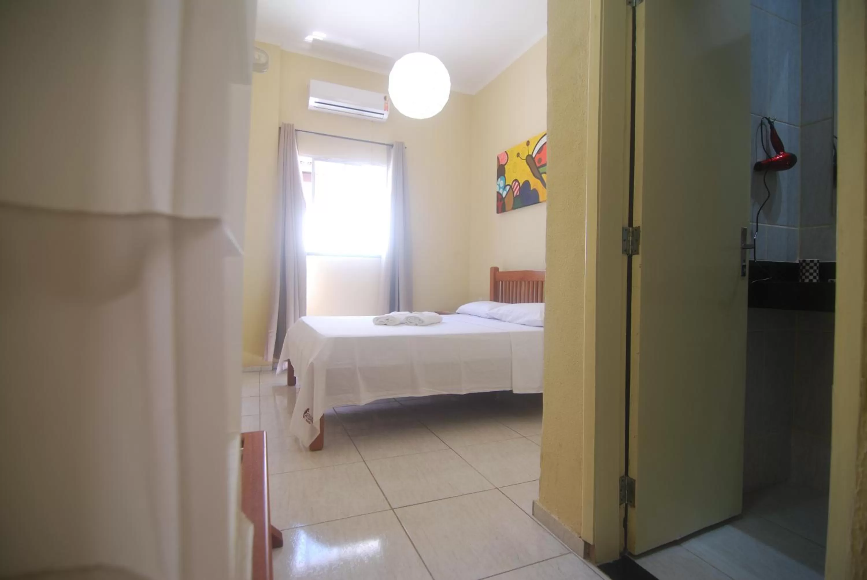 Bed in Refúgio Pousada Fortaleza