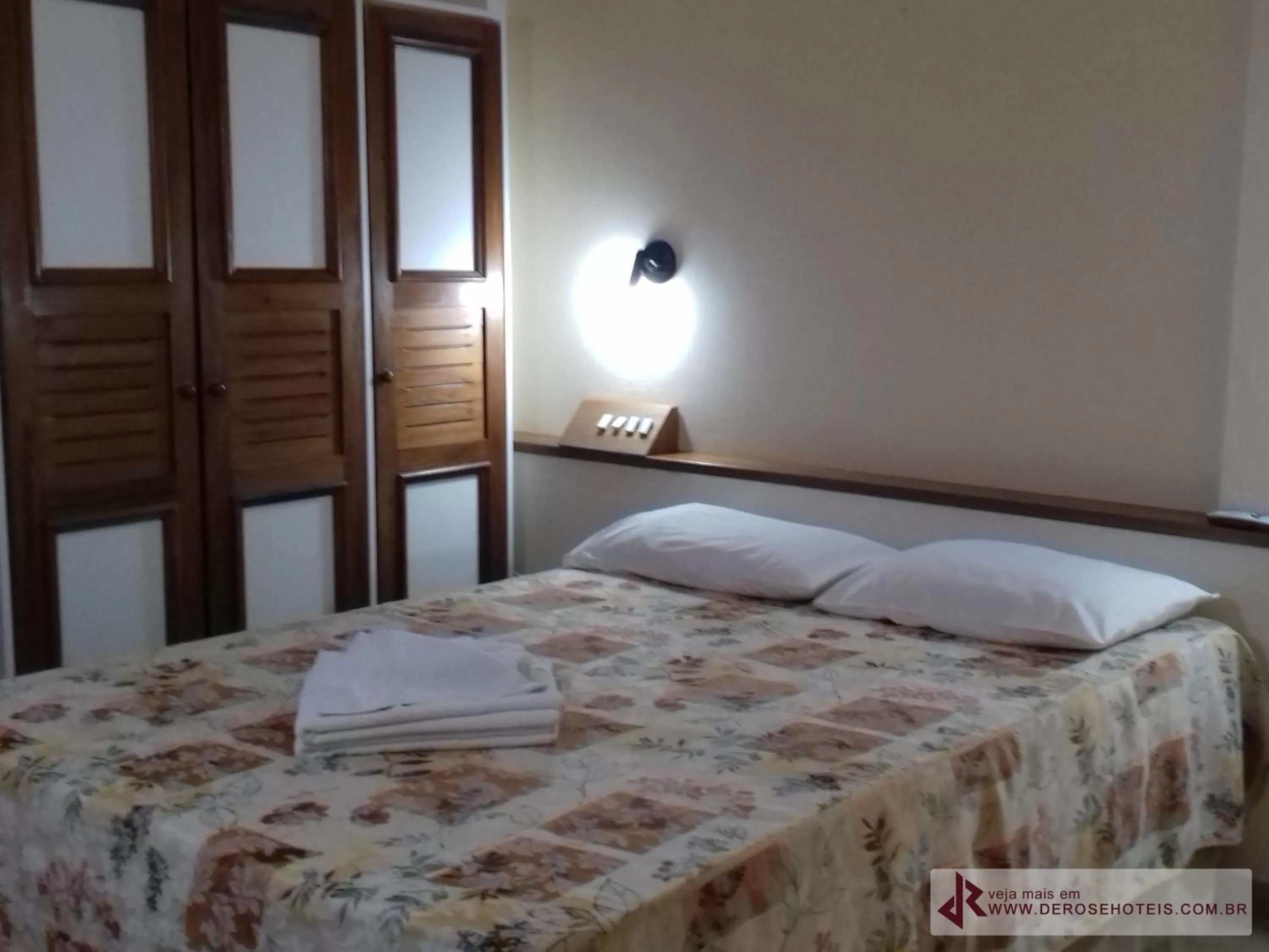 Bed in De Rose Palace Hotel