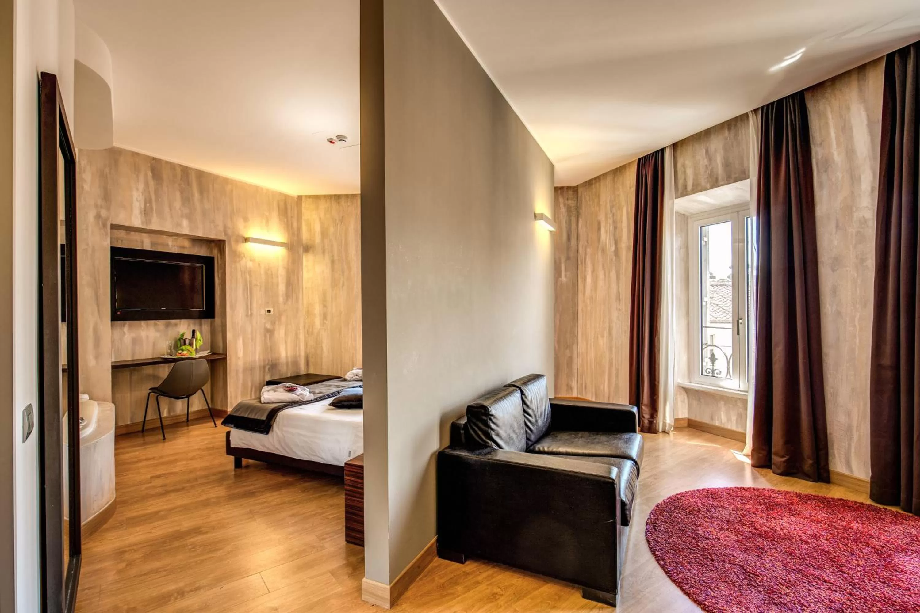 Living room, Bed in Trevi Collection Hotel - Gruppo Trevi Hotels