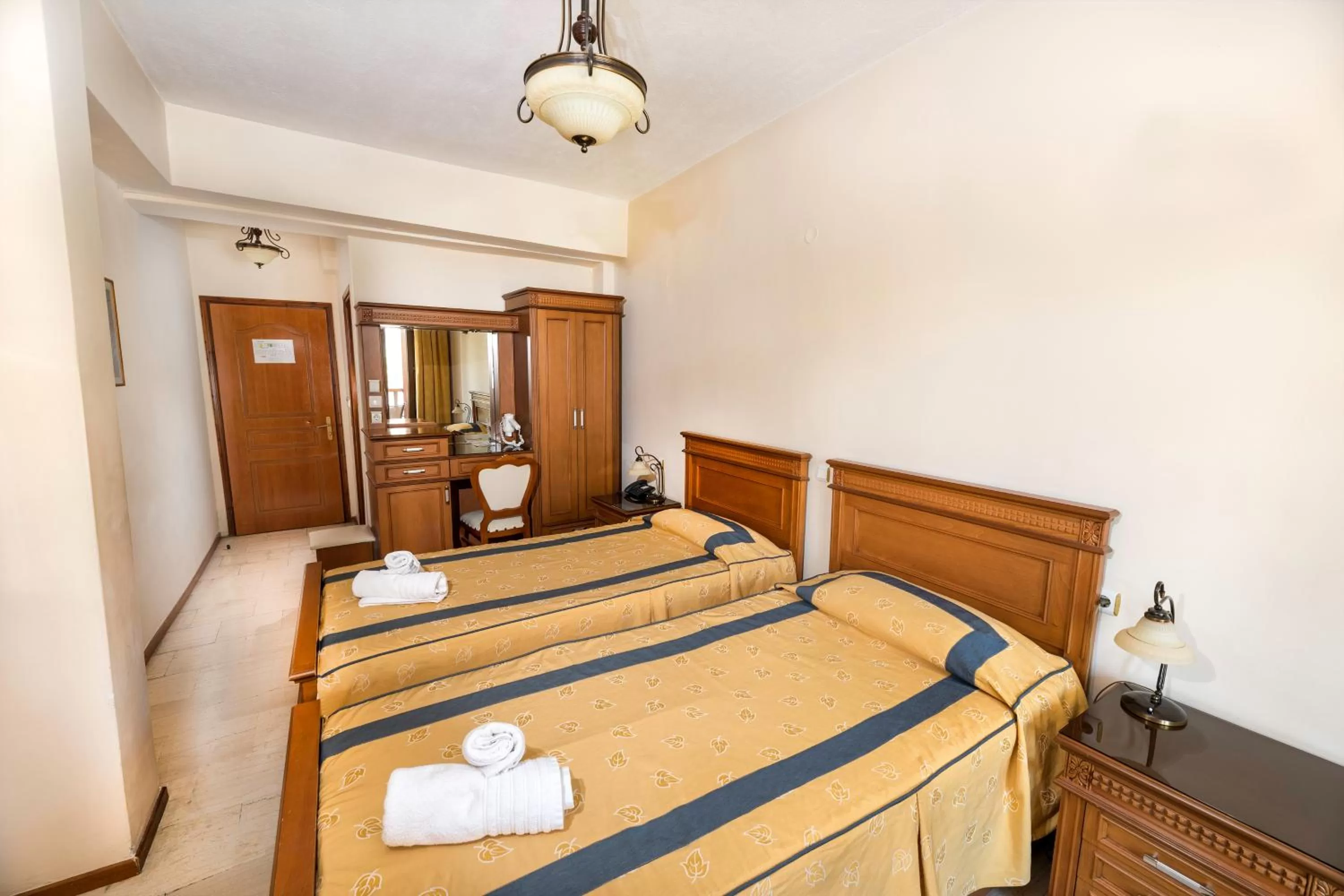 Bed in Famissi Hotel