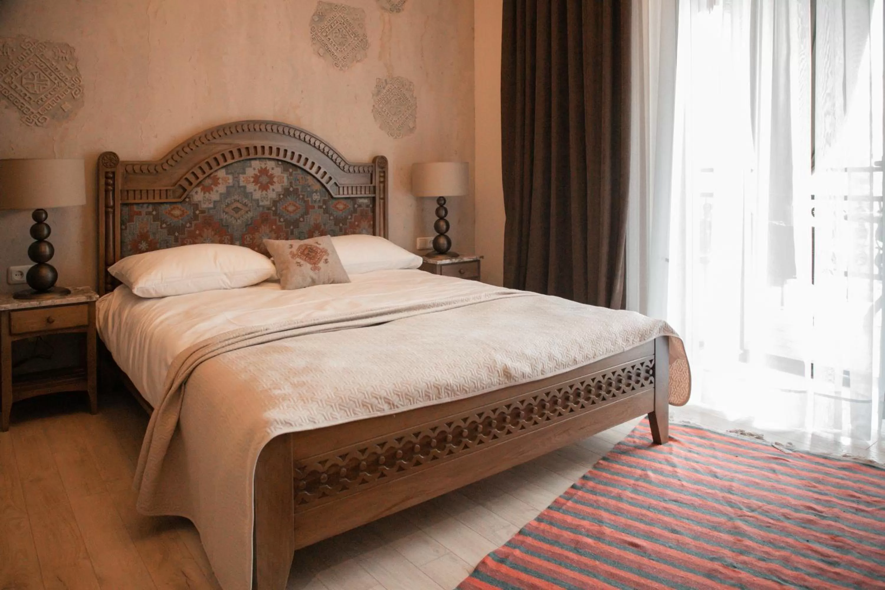 Bed in Boutique ETHNO HOTEL