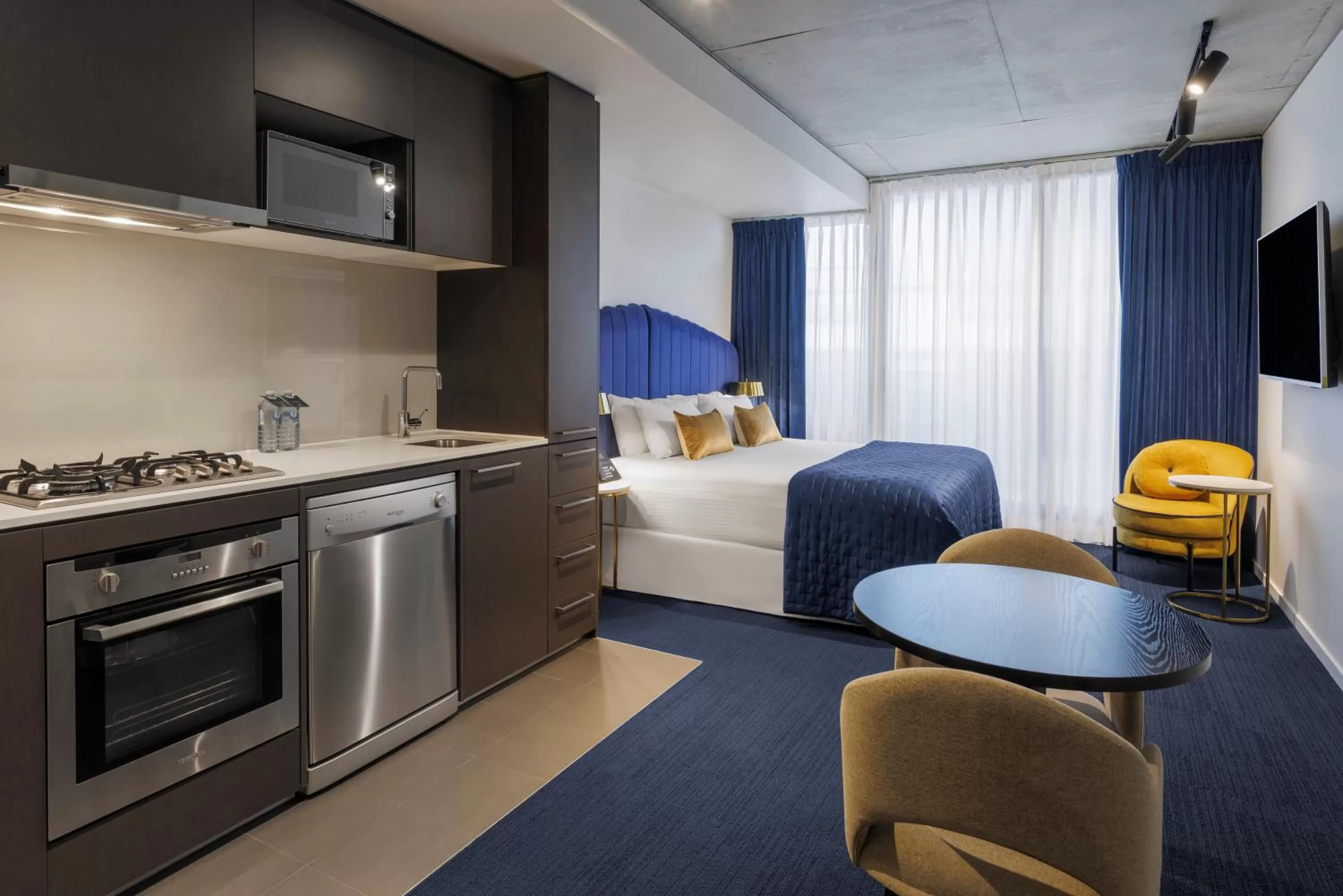 Kitchen or kitchenette in Avani Melbourne Jazz Corner Residences