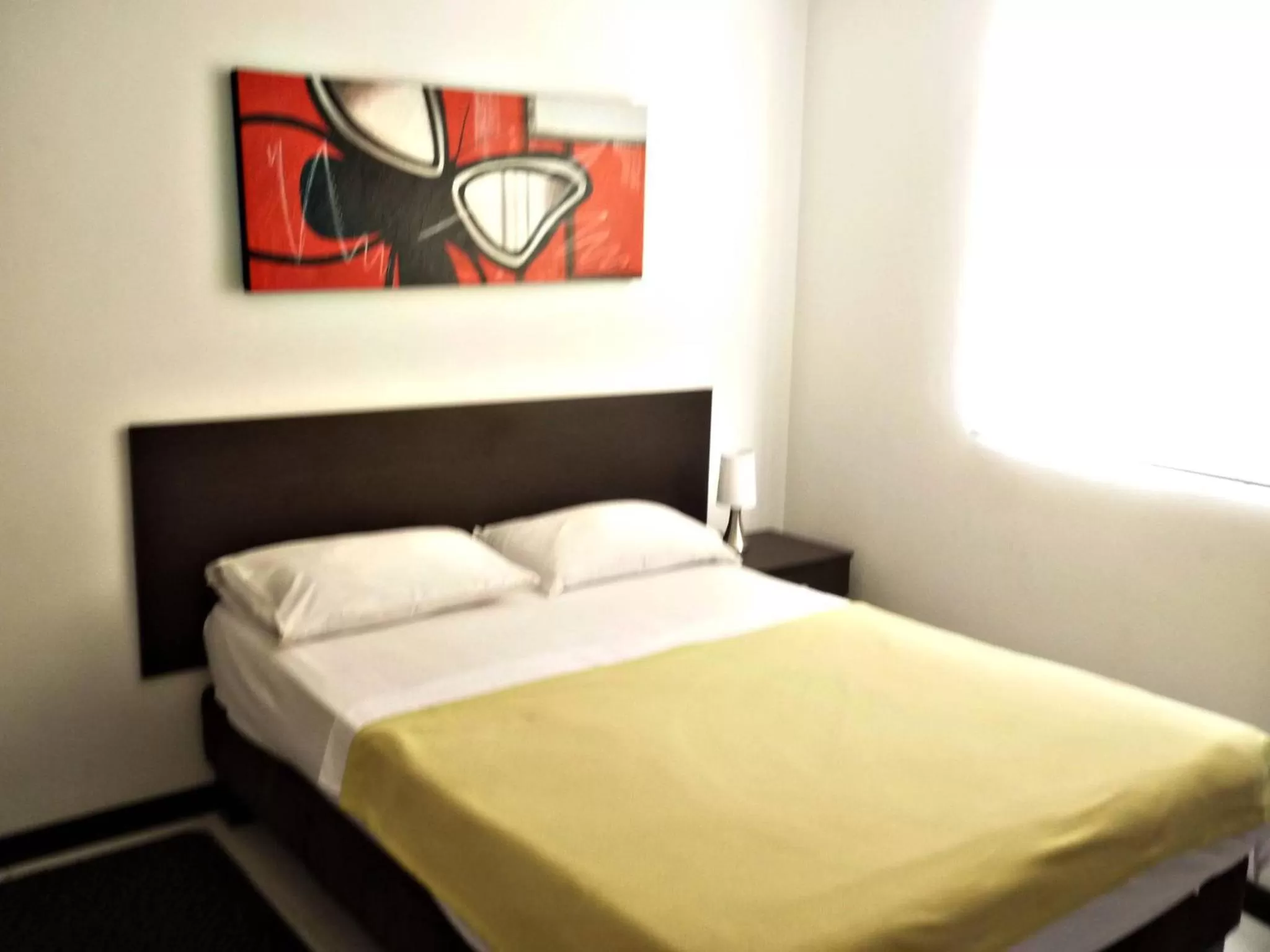 Day in Apartasuites San Marcos