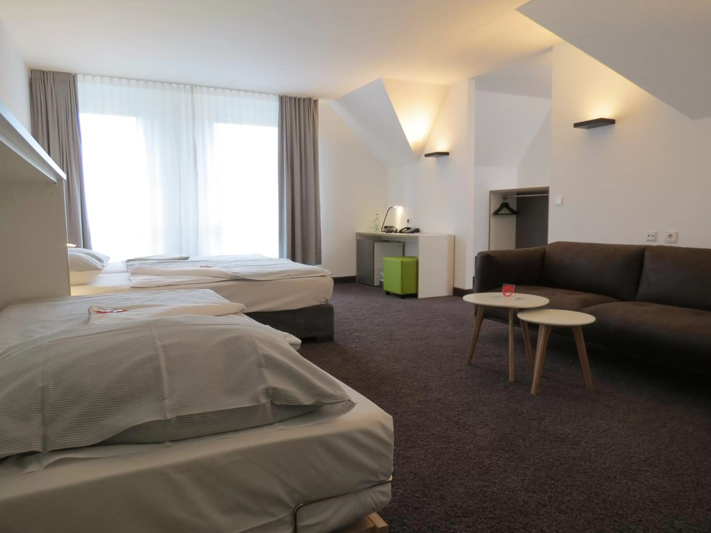 Photo of the whole room, Bed in Comfor Hotel Ulm City