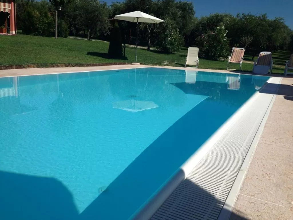 Pool view in AGRITURISMO MELOGRANO D'ORO
