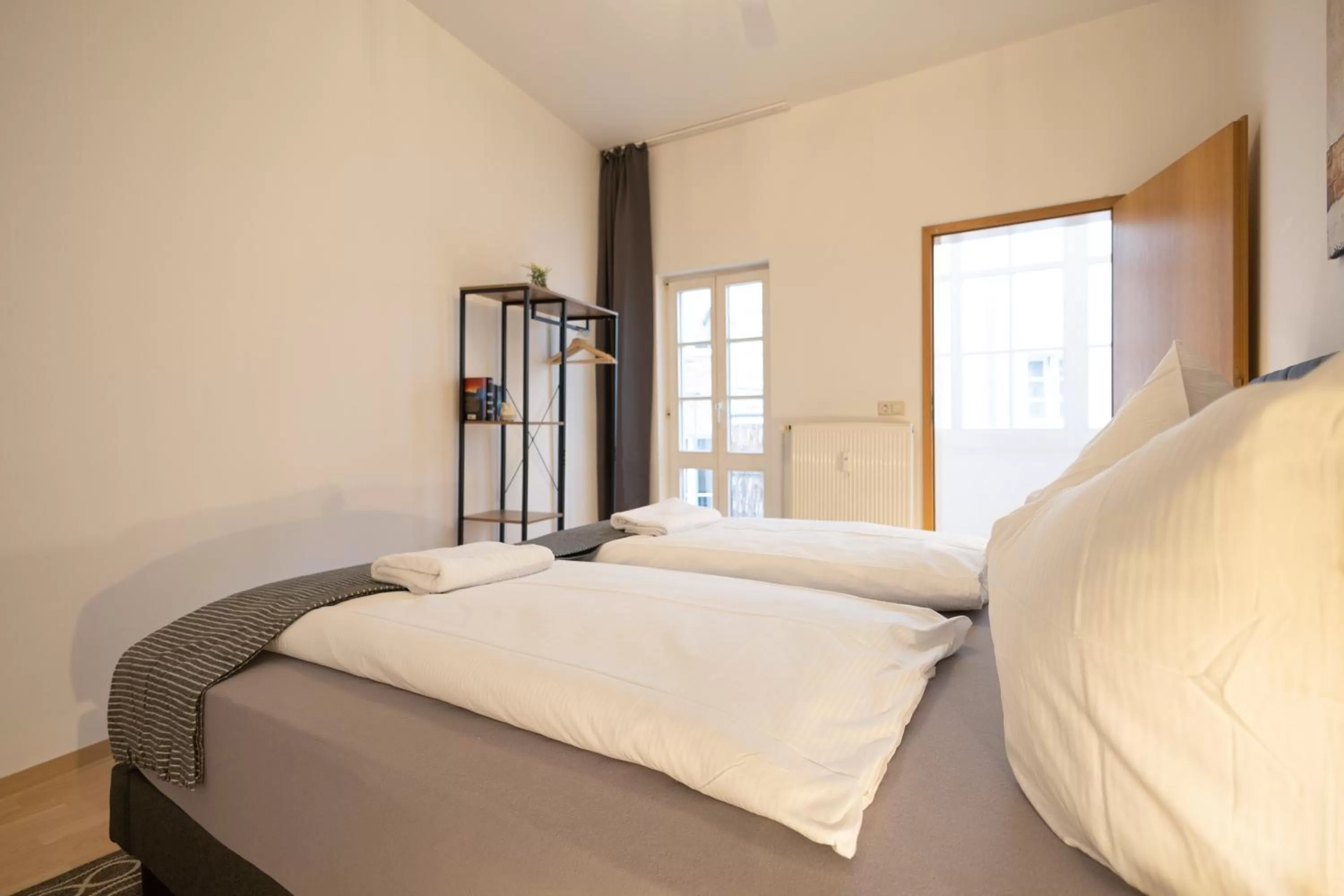 Bed in Ko-Living Space an der Oper - Street Art Design Apartments