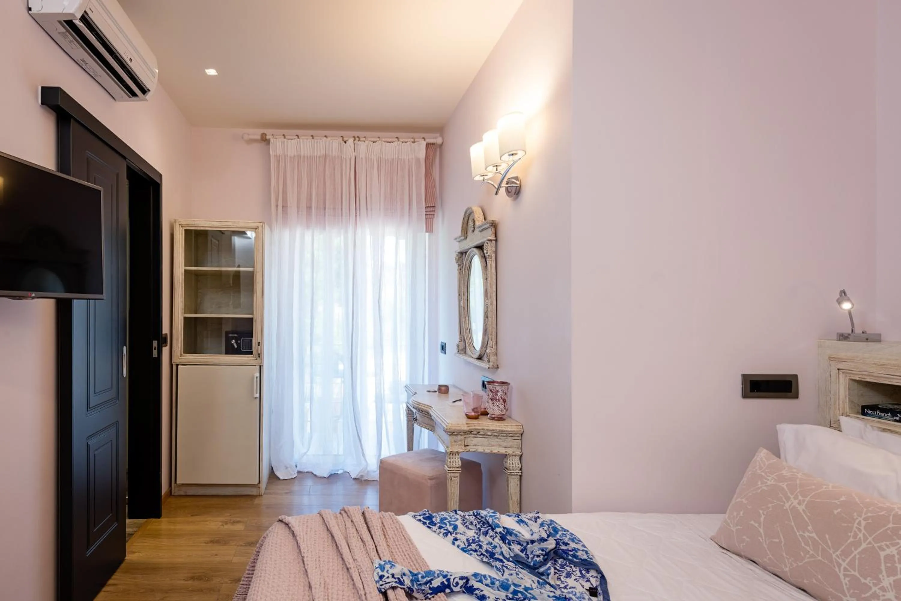 Bed in Anthemion Suites and Villas