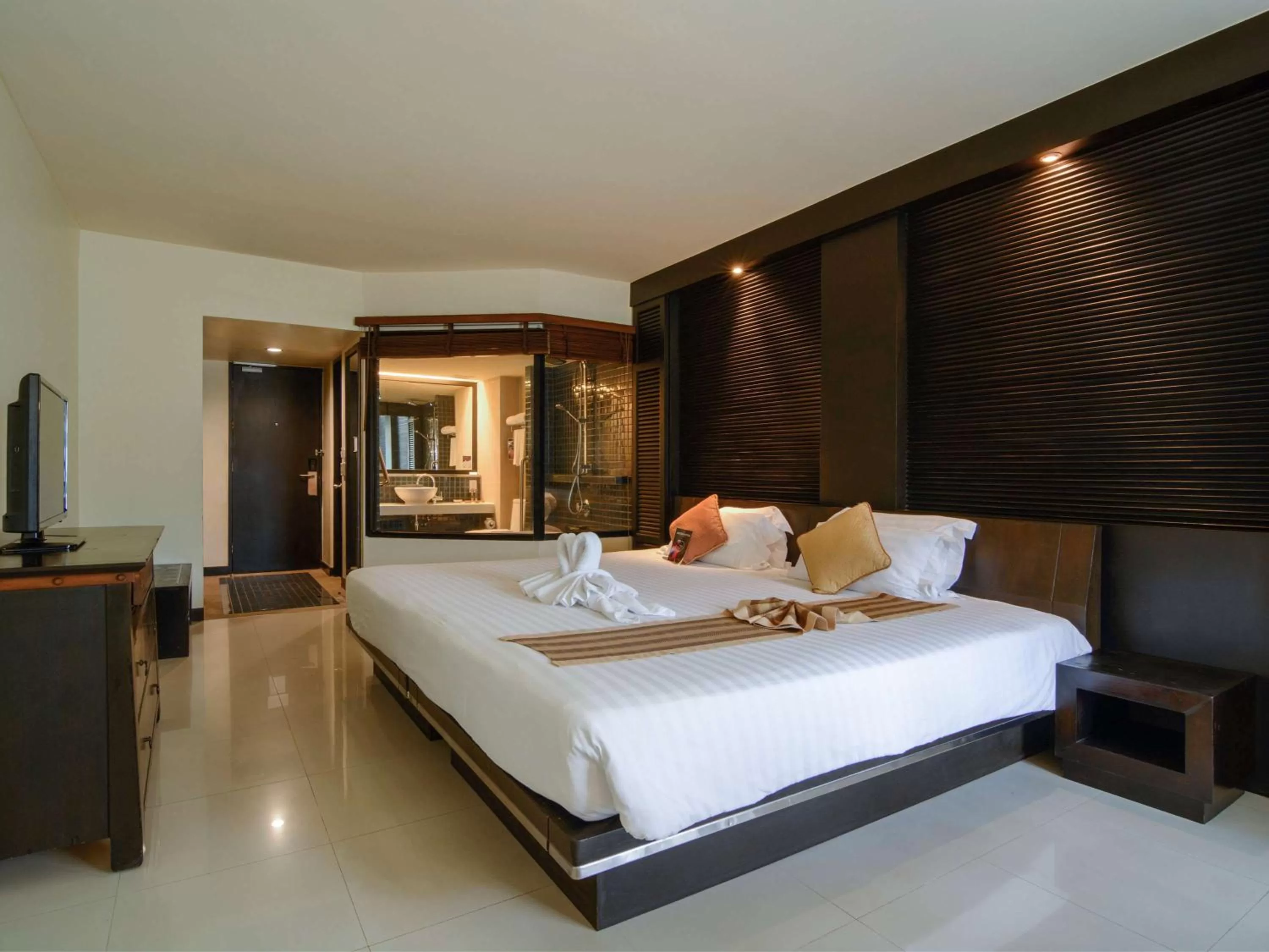 Photo of the whole room, Bed in The Nouveau Chumphon Beach Resort And Golf
