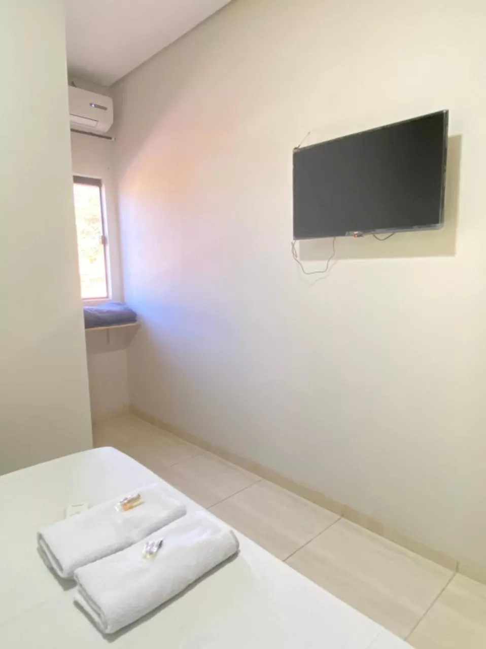 TV/Entertainment Center in Hotel Pousada Aeroporto