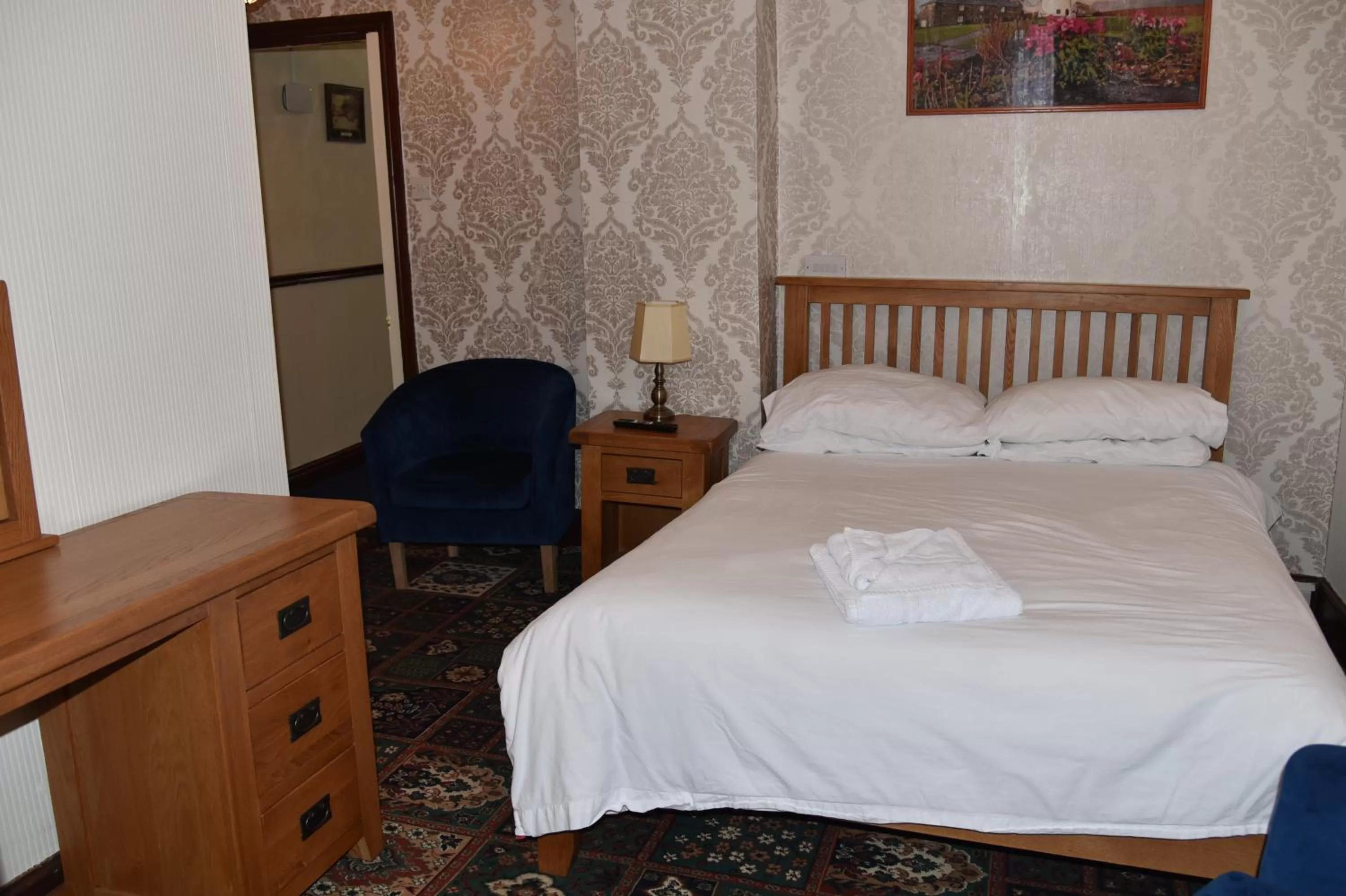 Bed in Dinorben Arms Hotel