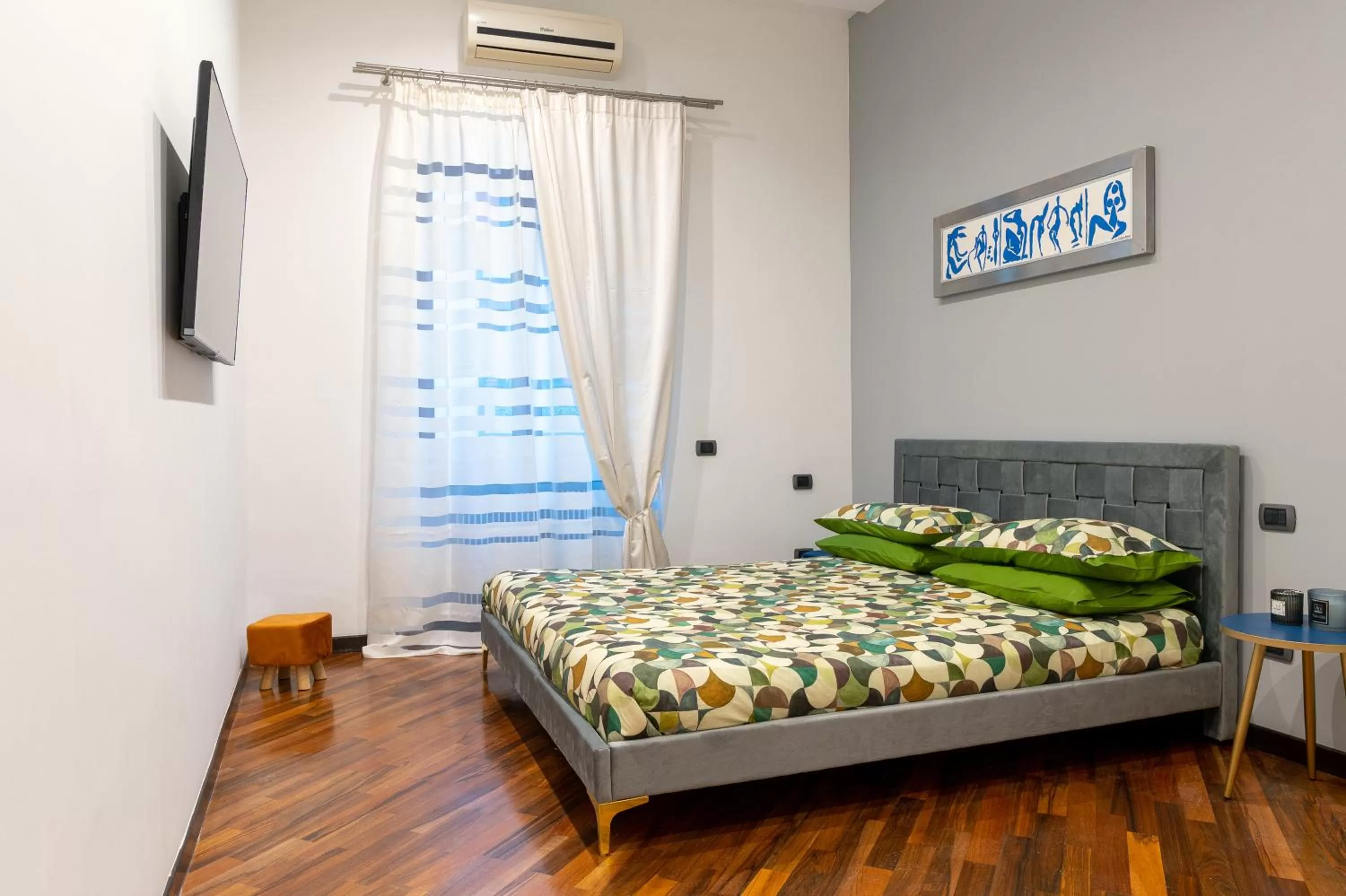 Bed in ROOMITO apartments