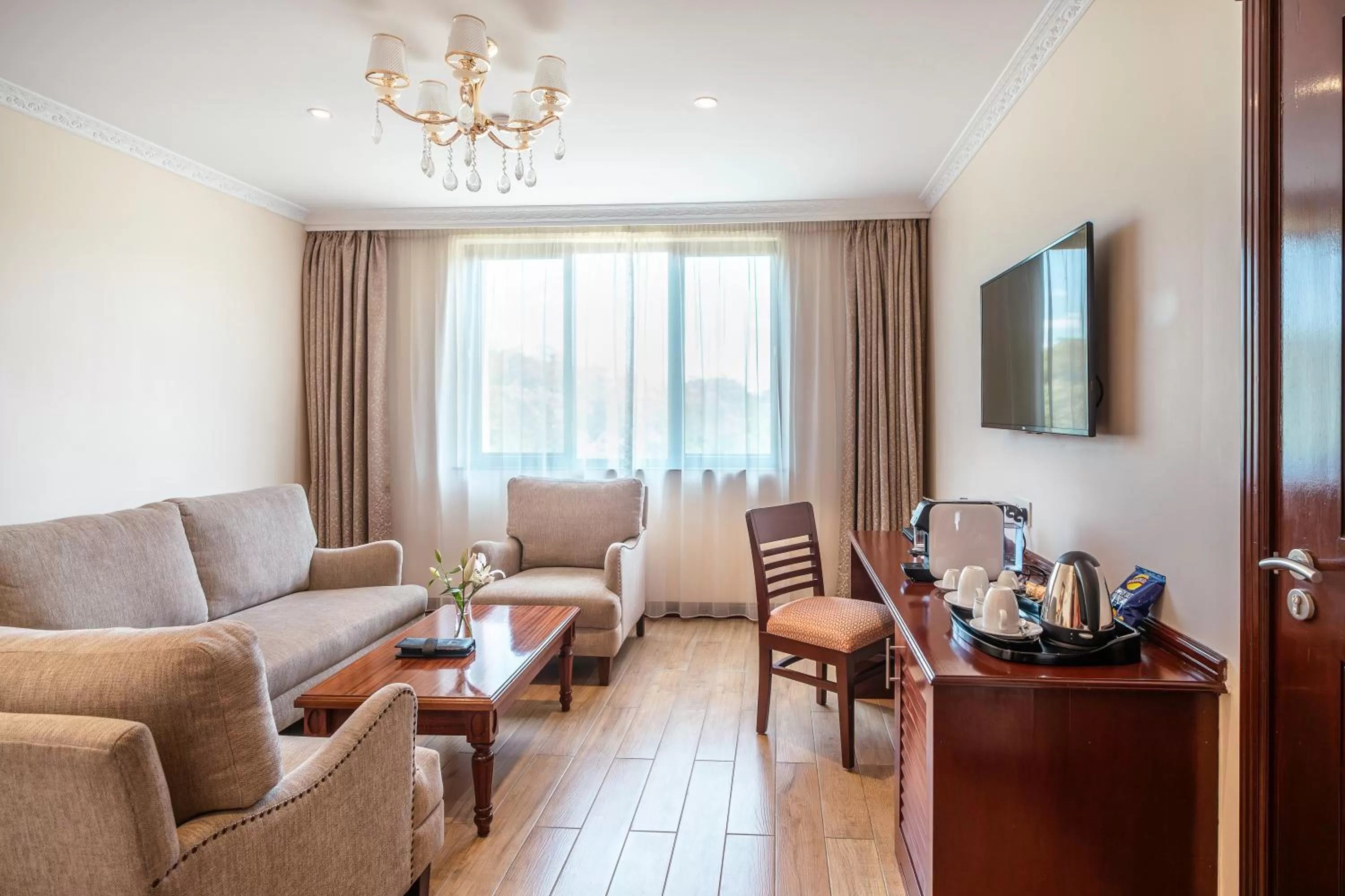 Seating area in Sarova Woodlands Hotel and Spa